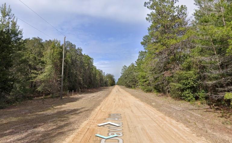 Excellent opportunity to secure a high and dry 0.22-acre building lot in Interlachen Lakes Estates! Power lines are already established along David Ave for straightforward utility hookups, offering the perfect rectangular layout for your next project or land portfolio.
The property carries highly flexible R-2 zoning, which permits traditional site-built homes, modular constructions, or manufactured/mobile homes. There is no HOA, no neighborhood restrictions, and no monthly fees. Drive by the block today to check out the land and map out your next custom build!