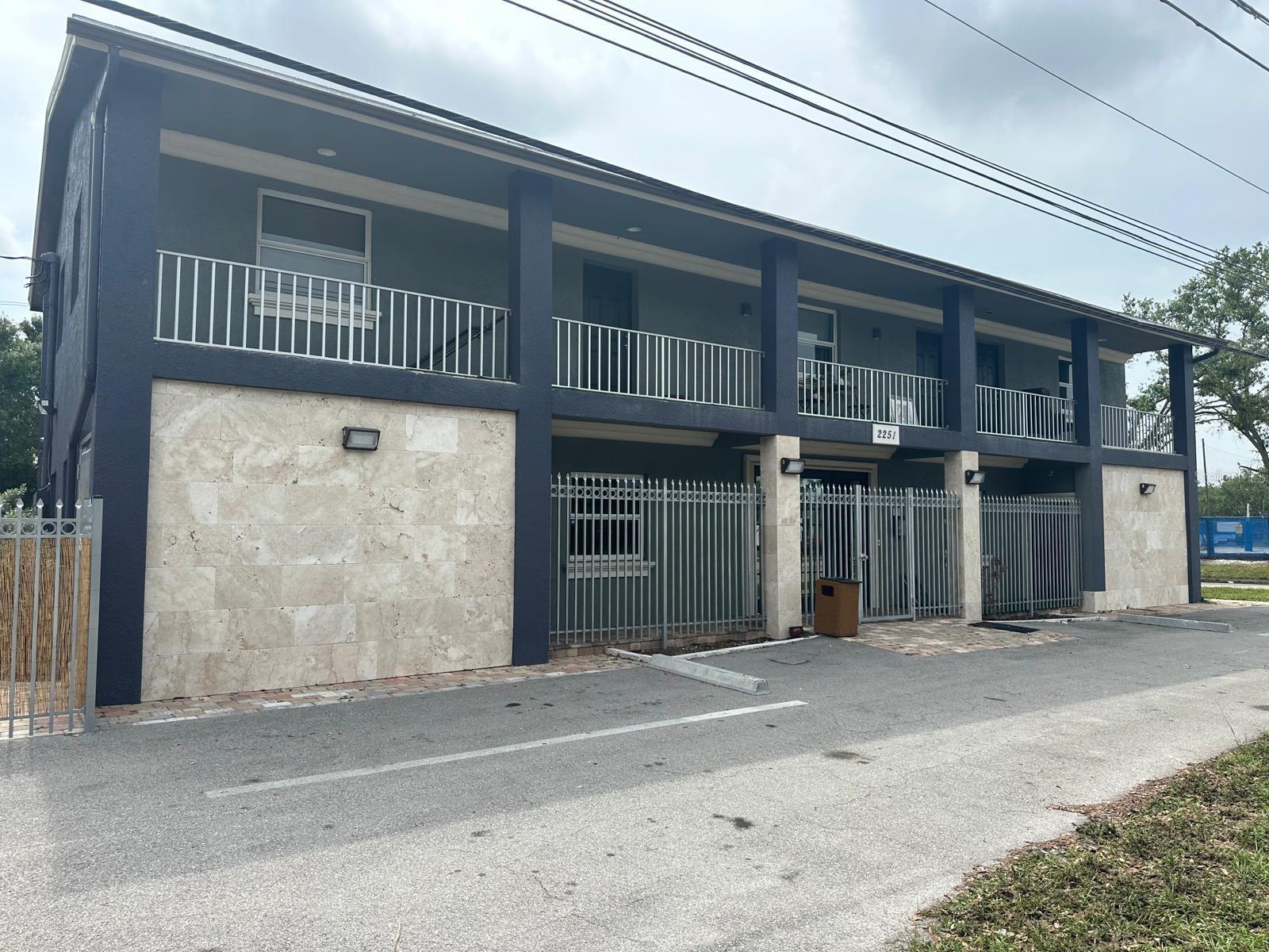 Positioned in the heart of rapidly revitalizing Downtown Fort Myers, this unique mixed-use property offers exceptional income and redevelopment potential in one of Southwest Florida's most dynamic growth corridors. Conveniently located directly adjacent to the renowned Fort Myers Skatium, a popular destination featuring an ice skating arena, athletic gymnasium, and fitness center, the property benefits from consistent traffic and strong community presence. Adjacent property 2109 Crawford included with sale for $1,490,000. The building features three distinct income-producing spaces. Upstairs, you'll find two beautifully renovated residential condominium units, including a spacious 3-bedroom, 2-bath open-concept residence and a well-appointed 2-bedroom, 2-bath unit. Both offer modern finishes and comfortable living accommodations in a highly desirable downtown setting. The ground floor is currently configured as a music studio, providing flexible commercial space suitable for creative professionals, retail, office, wellness, or specialty business use. A fully fenced parking lot with approximately 10 dedicated parking spaces adds significant value, offering convenience, security, and ample parking for tenants, customers, and guests. Downtown Fort Myers is undergoing a remarkable transformation, with luxury residential developments, expanded hospitality offerings, and major infrastructure investments reshaping the city's skyline and fueling economic growth. This property presents an outstanding opportunity for investors, owner-users, or developers seeking a foothold in one of Florida's most exciting urban markets. Don't miss the chance to own a versatile mixed-use asset in a thriving downtown location with endless possibilities.