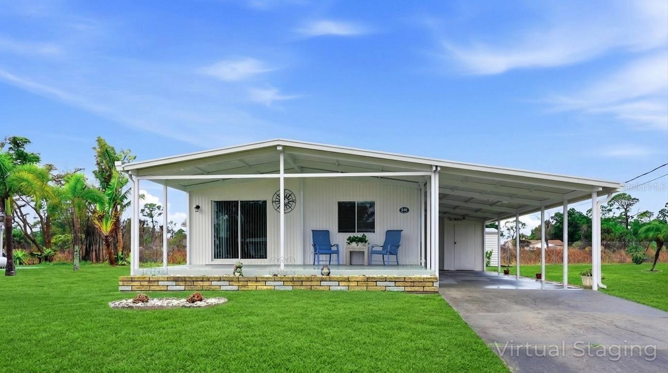 Virtually Staged. Boat Access + Fully Updated | No Mandatory HOA | Coastal Living in Englewood Move right into this fully updated manufactured home in Englewood offering rare access to a voluntary HOA with marina and boat slips (subject to availability)—a standout opportunity for buyers seeking affordable coastal living near the water. Ideally positioned just minutes from the Intracoastal Waterway, Gulf beaches, Boca Grande, and Manasota Key, this property delivers both lifestyle and location. Major improvements have already been completed, including a new TPO roof (2024), new A/C heat pump (2023), luxury vinyl plank flooring throughout (2024), and a fully renovated kitchen (2026) featuring plywood construction cabinets with soft-close doors and drawers, along with new stainless-steel appliances (2025–2026). Bathrooms have been refreshed with new vanities and toilets (2024). Exterior upgrades include fresh paint (2025), custom gutters and downspouts (2024), and a new carport, front overhang, and porch (2024). With no mandatory HOA, boating access, and close proximity to beaches, fishing, golf, and dining, this move-in ready Englewood home is ideal as a winter retreat, investment property, or full-time residence. some photos are virtually staged