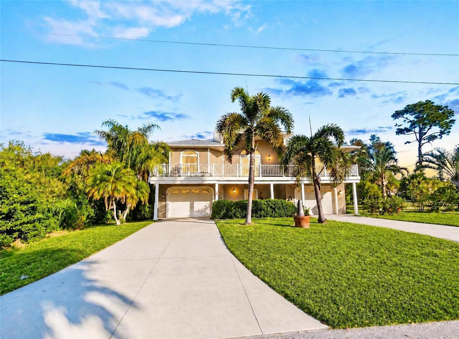 Welcome to an extraordinary waterfront estate offering the perfect blend of luxury, space, efficiency, and endless possibilities. Situated on an oversized double lot, this one-of-a-kind property offers an incredible opportunity to own a private waterfront retreat while also benefiting from a second buildable lot that can be split and sold separately. The additional lot even features its own private dock, creating exceptional value for investors, builders, or anyone seeking a truly unique waterfront lifestyle.

Boasting 4,746 square feet of living space, this impressive residence features 4 spacious bedrooms, 3.5 bathrooms, and an incredibly versatile floor plan designed for both comfortable everyday living and entertaining on a grand scale. One of the home’s standout features is the presence of two full kitchens, making it ideal for multi-generational living, extended guests, entertaining, or creating a private guest suite.

The expansive main kitchen showcases generous cabinetry, an oversized island, abundant counter space, and flows seamlessly into the home’s open living areas while capturing beautiful water views throughout.

Built for peace of mind and modern efficiency, the home is equipped with hurricane-impact windows and doors, brand-new dual-zone HVAC systems serving each floor independently, a whole-home solar power system covering the entire roof to significantly reduce energy costs, and a Tesla EV charger already installed.

Step outside and experience true Florida waterfront living. Enjoy breathtaking views from expansive decks on both the front and rear of the home, relax by the pool, rinse off in the convenient outdoor pool shower, or spend the day on the water from your private dock. Whether you’re watching the sunrise with your morning coffee or entertaining family and friends at sunset, every outdoor space has been designed to maximize the incredible waterfront setting.

Properties offering this combination of size, luxury, energy efficiency, waterfront access, and future development potential rarely become available. Whether you’re looking for a spectacular primary residence, a multi-generational home, or a unique investment opportunity with the ability to split and develop the additional waterfront lot, this exceptional property truly offers it all.

Schedule your private showing today and experience one of Port Charlotte’s most unique waterfront estates.
