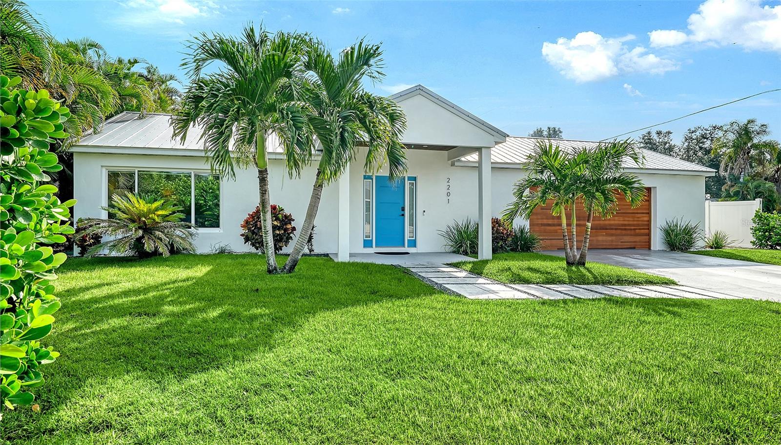INCOME TODAY. HOME TOMORROW. OPPORTUNITY ALWAYS.

An incredible opportunity to own a beautifully renovated, FULLY TURNKEY Sarasota retreat offering the best of both worlds: a family-ready residence and an established income-producing investment! Located in desirable ARLINGTON PARK, this 4-bedroom, 3.5-bath home features 2,267 square feet of living space, a 2-car garage, and a private resort-style pool with heater and chiller.

With approximately six years of short-term rental history, the property has generated approximately $75,000 annually while allowing the sellers to reserve 12 weeks each year for personal enjoyment. The seller reports approximately $44,000 in future bookings through the existing property management company. 

COMPLETELY RENOVATED in 2020, the home features an open floor plan, luxury vinyl flooring, modern finishes, and a spacious kitchen with stone countertops and a large center island. IMPACT windows and doors, a METAL roof, and TURNKEY furnishings add to its appeal and value.

Step outside to your private tropical oasis featuring a heated saltwater pool, expansive paver deck, covered entertaining area, built-in grilling island, mature landscaping, and privacy fencing. Situated on a spacious corner lot, the property also offers convenient side ACCESS FROM GROVE PLACE.

Enjoy a prime Sarasota location less than 10 minutes from VIBRANT DOWNTOWN SARASOTA and the WORLD-FAMOUS SIESTA KEY BEACH, with convenient access to dining, shopping, entertainment, and coastal attractions.

Whether you're seeking a full-time family residence, a Florida vacation getaway, or an investment opportunity with established rental history, this versatile property offers exceptional flexibility. Move right in, enjoy your own private retreat, or continue its income-producing potential while potentially offsetting ownership costs.

A beautifully updated home. An established rental history. ENDLESS POSSIBILITIES TO ENJOY THE FLORIDA LIFESTYLE ON YOUR TERMS.