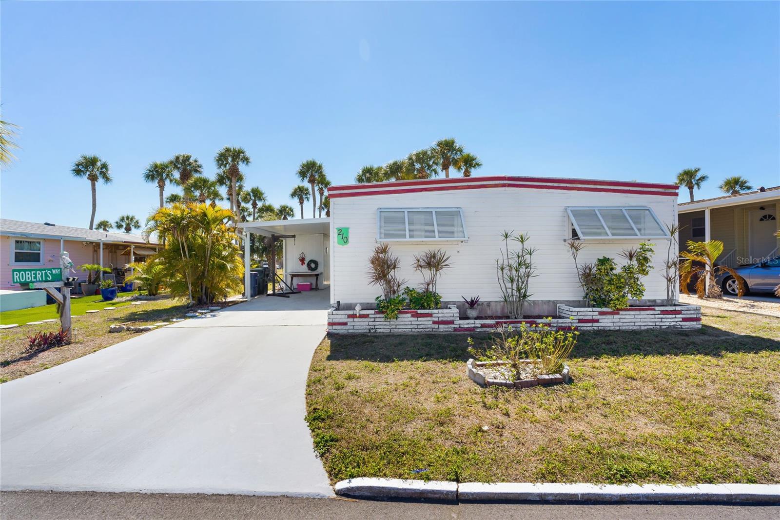 Enjoy an active Florida lifestyle in this well-maintained home in an amenity-filled 55+ Venice community. With several updates already in place, this home offers a comfortable starting point and the opportunity to personalize the interior to suit your style.

Updates include newer windows, vinyl plank flooring, kitchen appliances, washer, and dryer. A screened lanai provides space to enjoy morning coffee or unwind at the end of the day, while the backyard paver patio overlooks the community amenity center. A covered carport and outdoor storage shed with laundry facilities add everyday convenience.

Community amenities include two heated pools, two spas, a fitness center, tennis courts, bocce ball, shuffleboard, a putting green, horseshoes, cornhole, billiards, and ping-pong. Residents also enjoy two clubhouses, a tiki hut, and bus transportation for community outings. The HOA fee includes internet, cable, lawn maintenance, and access to community amenities.

Convenient to Venice Beach, shopping, dining, and medical facilities, this home is an option for seasonal enjoyment or year-round living. Bring your decorating ideas and explore the possibilities.
