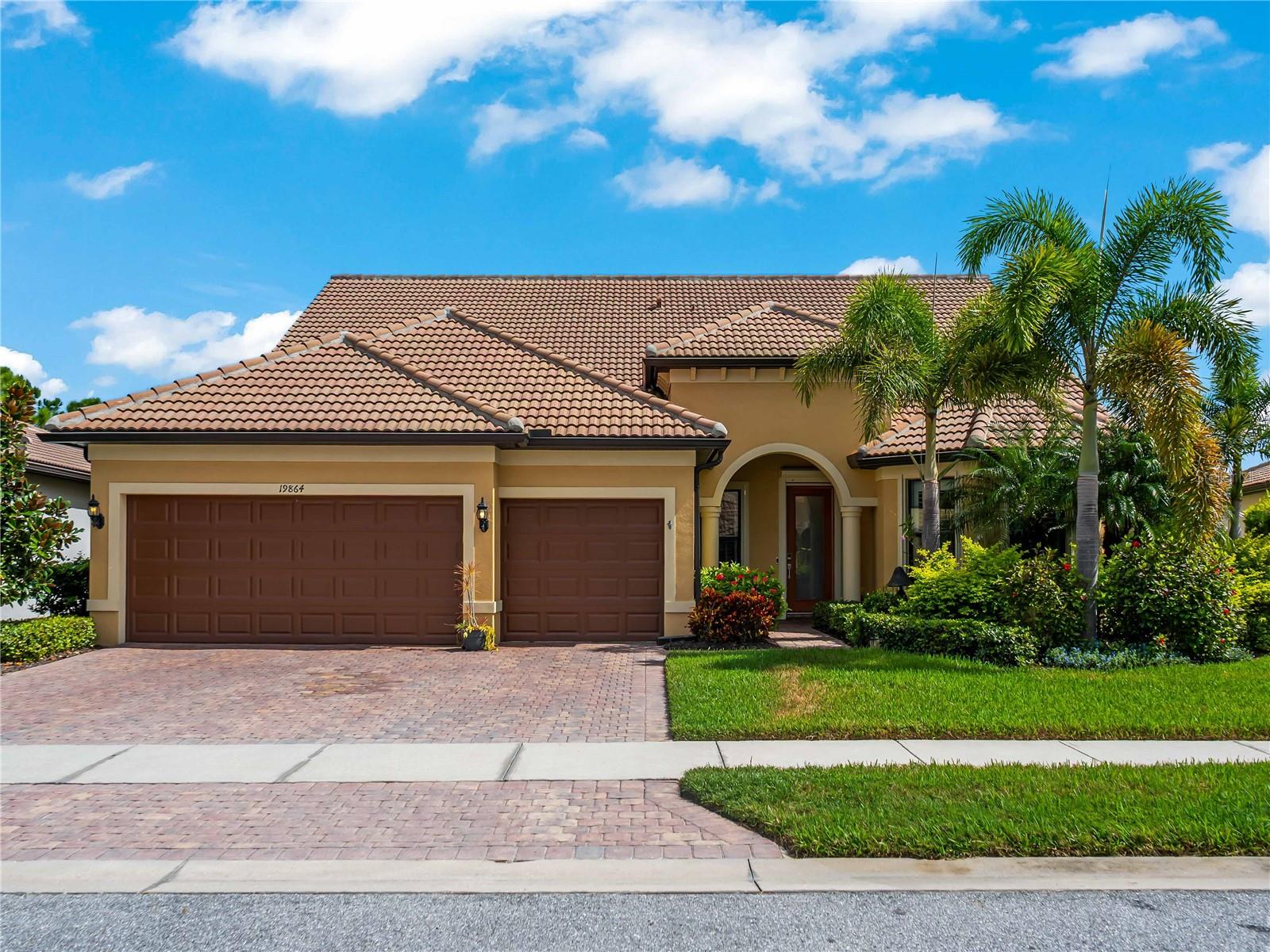 **RESORT-STYLE LIVING IN ISLANDWALK | $125,000+ IN UPDATES | SPECTACULAR 30-FOOT POOL & SPA | LOW CDD and HOA FEES**

Why settle for ordinary when you can live like you're on vacation every day? Welcome to this beautifully updated 4-bedroom, 4-bath pool home in gated IslandWalk! Situated on an oversized cul-de-sac lot with peaceful pond and preserve views, this home combines privacy, luxury, flexible living space, and Florida's coveted indoor-outdoor lifestyle. 

YOUR OWN PRIVATE BACKYARD RESORT! Pocket sliding glass doors open to an incredible outdoor oasis designed for entertaining and relaxation. The custom 30-foot pool features color-changing LED lighting, fountains, and an extended heated spa that cascades into the pool. Relax beneath the covered lanai, surrounded by mature privacy landscaping and tranquil views. Remote-controlled Storm Smart hurricane screens add convenience and protection.

OVER $125,000 IN UPDATES — BEAUTIFULLY REFRESHED AND MOVE-IN READY! Luxury vinyl plank flooring throughout, crown molding, shiplap accents, plantation shutters, and fresh paint create a bright, inviting atmosphere. The stunning updated kitchen features quartz countertops, an oversized island, tall cabinetry, a closet pantry, and stainless steel appliances, including a Bosch refrigerator and induction cooktop.

SPACE FOR EVERYONE — INCLUDING MULTIGENERATIONAL LIVING! The thoughtfully designed floor plan offers flexibility and privacy. The spacious first-floor primary suite features a tray ceiling, pool access, walk-in closet, and spa-inspired bath with dual vanities, soaking tub, and separate shower. Two additional main-floor bedrooms include one with a private ensuite bath. A dedicated office with glass French doors provides the perfect work-from-home space.

UPSTAIRS IS A RETREAT OF ITS OWN! An oversized fourth bedroom, full bath, and generous bonus room offer ideal space for extended family, guests, a media room, or recreation.

THE EXTRAS MAKE THE DIFFERENCE! Enjoy abundant storage, an oversized three-car garage with a 4-foot extension for a workshop or additional storage, and extensive hurricane protection featuring Kevlar screens on the first floor and front entry, accordion shutters upstairs, and Storm Smart lanai screens. Improvements include a 2020 HVAC system, 2025 Performance Platinum 80-gallon water heater, and 2024 LG washer and dryer.

LIVE THE ISLANDWALK LIFESTYLE! This amenity-rich gated community offers low HOA fees that include lawn and landscape maintenance, cable, and internet. Residents enjoy two resort-style zero-entry pools, a lap pool, hot tubs, tennis, pickleball, bocce, fitness centers, walking trails, a community garden, dog parks, and an activities director coordinating a vibrant calendar of events.

LOCATION, LOCATION, LOCATION! Minutes from Gulf beaches, Venice Island, Wellen Park, Costco, restaurants, shopping, medical facilities, and CoolToday Park, spring training home of the Atlanta Braves. Schedule your private showing today!