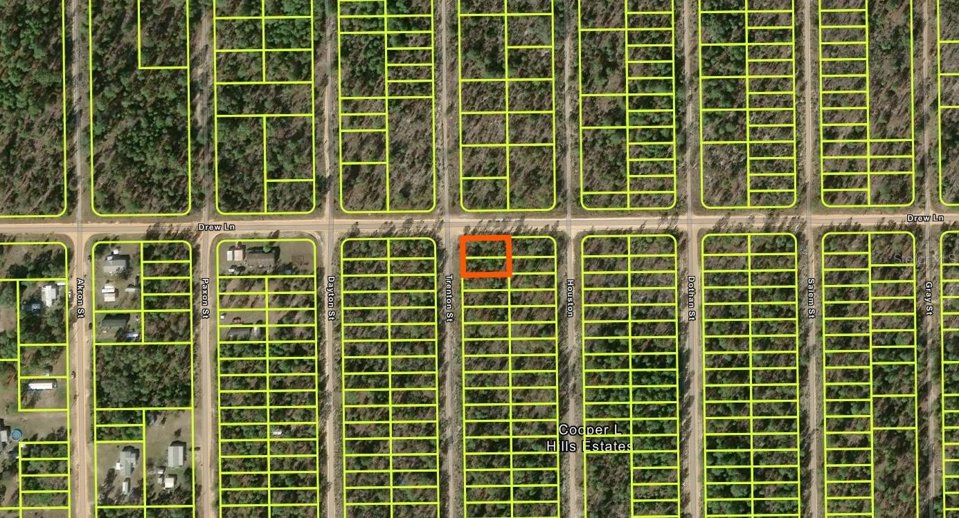 AFFORDABLE INTERLACHEN HOMESITE WITH FLEXIBLE RESIDENTIAL OPTIONS! This approximately 0.35-acre lot offers about 110 x 140 feet of space with power nearby, no HOA, and direct road frontage. Single-family homes, mobile homes, and tiny homes over 400 sq ft are permitted, subject to Putnam County requirements, setbacks, and permitting. A private well and septic system will be needed. Located in a quiet wooded area of Interlachen, this parcel offers a practical opportunity for a future homesite, Florida getaway, or long-term land investment. Enjoy nearby lakes, outdoor recreation, and easy access to local shopping and services. Parcel ID: 05-10-24-4940-0080-0010. Buyer to independently verify zoning, allowable uses, building requirements, utilities, flood information, survey, access, and all other due-diligence items with Putnam County and applicable agencies.