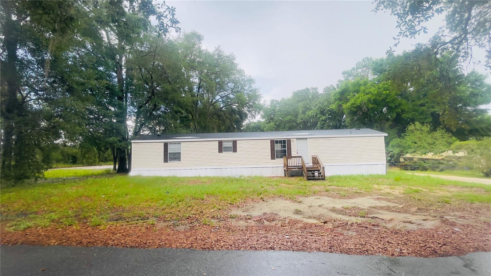 3 bedroom, 2 bath manufactured home situated on a corner lot. New roof installation in progress and new luxury vinyl plank flooring recently installed. The home features a split bedroom floor plan and an inside laundry room. Conveniently located near shopping, schools, and city amenities. Great opportunity for investors looking for rental units that are move-in ready. Call now to schedule  your showing!