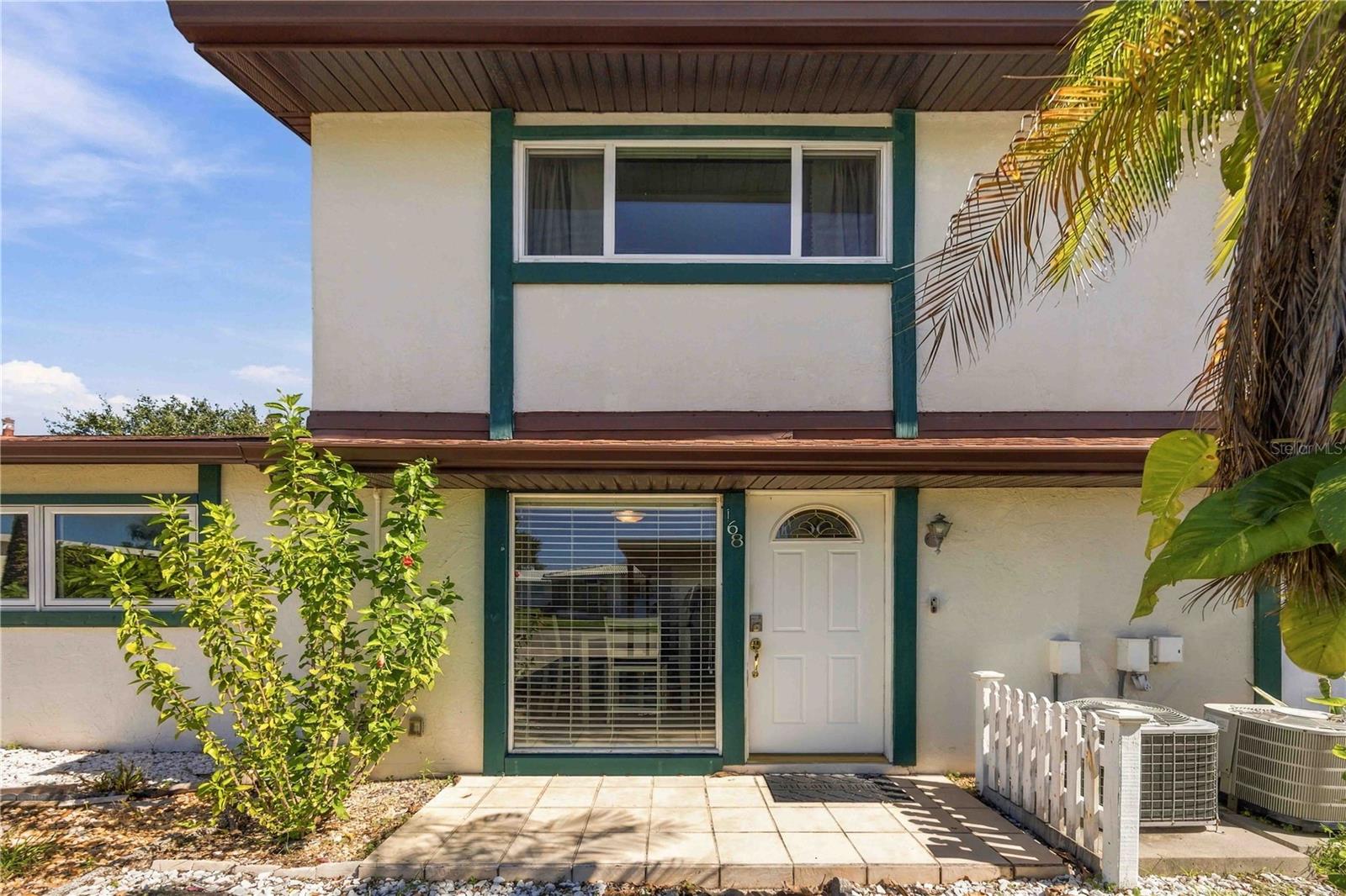 COASTAL LIVING AT AN AFFORDABLE PRICE IN CIRCLE WOODS OF VENICE – FULLY FURNISHED AND OFFERED TURNKEY! Discover the perfect blend of comfort, convenience, and Florida lifestyle in this charming 2-bedroom, 2.5-bath condo/townhouse located in the desirable, pet-friendly community of Circle Woods in South Venice! Offered fully furnished and turnkey, this home is ready for you to move right in and start enjoying paradise! Just minutes from beautiful Manasota Beach, Venice Beach, Caspersen Beach, and historic Downtown Venice, this home offers an ideal location for year-round living or a seasonal Florida retreat. Inside, enjoy a bright and inviting dining area with a convenient kitchen pass-through, a spacious living room, and a private screened lanai overlooking a peaceful setting—perfect for relaxing with your morning coffee or enjoying the Florida breezes. Newer roof, soffits, and gutters provide added value and peace of mind. LOW HOA FEES, NO CDD FEES, AND NO FLOOD INSURANCE REQUIRED make this an exceptional opportunity for affordable Florida living! Located just steps from the community pool, residents enjoy resort-style amenities including a clubhouse, fitness center, spa/sauna, library, and an active social calendar. Circle Woods offers a quiet, welcoming atmosphere while being conveniently located near US-41 and SR-776, providing easy access to shopping, dining, medical facilities, golf courses, and several of Southwest Florida's most beautiful Gulf beaches. Whether you're searching for a full-time residence, winter getaway, or low-maintenance Florida escape, this FULLY FURNISHED, TURNKEY HOME checks all the boxes! Simply bring your suitcase and start living the Florida lifestyle you've been dreaming of. YOUR PIECE OF FLORIDA PARADISE AWAITS—SCHEDULE YOUR PRIVATE SHOWING TODAY!