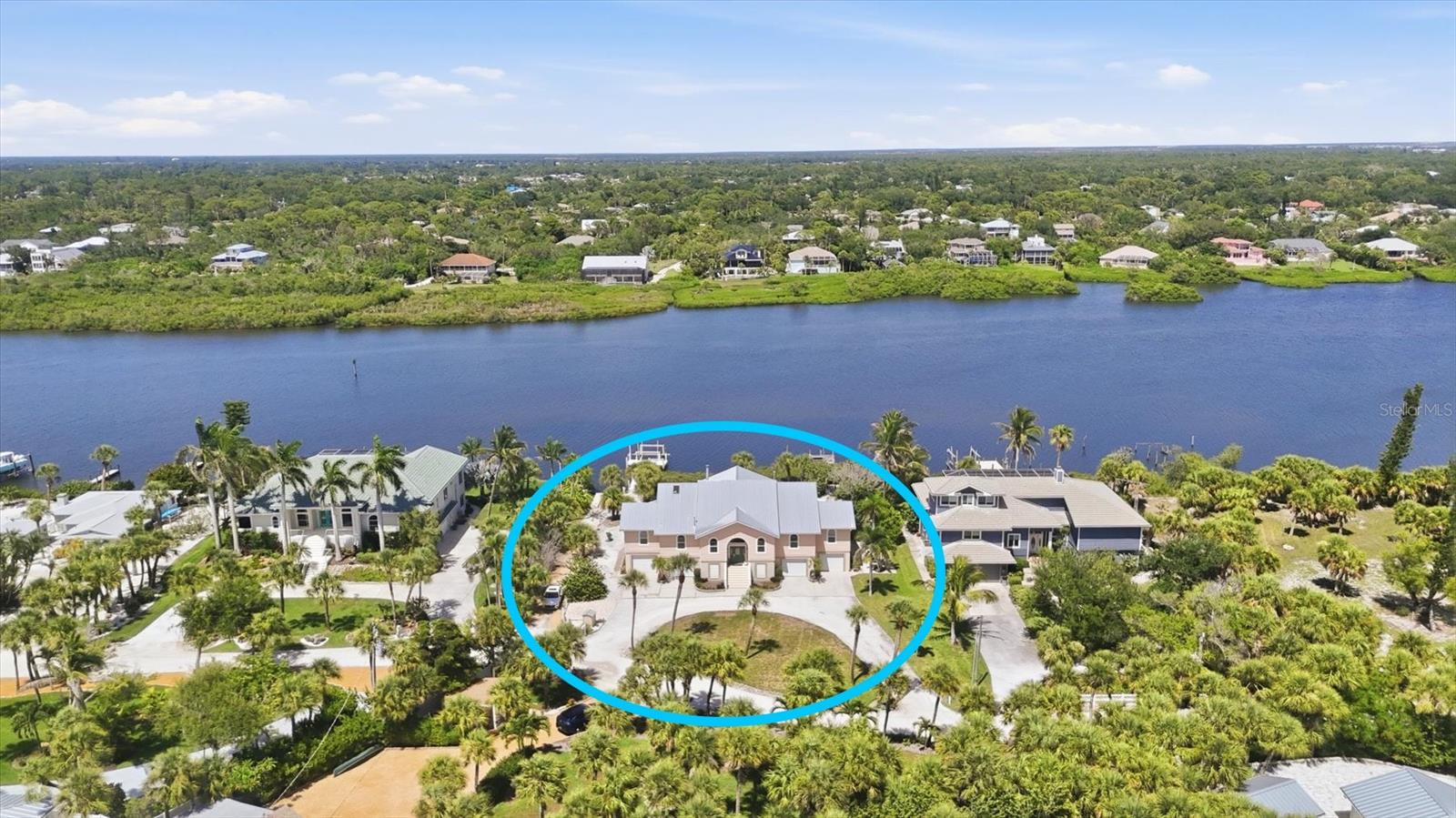 Imagine waking each morning to the gentle shimmer of Lemon Bay, coffee in hand as the sun rises over the water and ending your evenings with your toes in the sand, watching the Gulf paint the sky in breathtaking shades of orange and pink. This is more than a home; it’s a lifestyle few ever experience. Hidden behind the gates of the exclusive North Manasota Key community, along a secluded two-mile private road, this extraordinary Gulf-to-Bay estate offers the rare privilege of living where boating adventures and beach days become part of your everyday routine. Here, privacy, luxury, and nature exist in perfect harmony. Spanning more than 3,400 square feet, this thoughtfully designed waterfront retreat offers four bedrooms and four bathrooms with expansive living spaces bathed in natural light. Walls of windows frame panoramic views of Lemon Bay, creating a seamless connection between the beauty outside and the comfort within. Every room invites you to slow down, breathe deeply, and savor the rhythm of coastal living. Step outside and discover your own slice of paradise. Jump on your boat from the private bayfront dock for a day exploring the waterways, spend the afternoon kayaking or paddleboarding through calm waters, or cast a line just steps from home. When the Gulf calls, your deeded private beach access is only 300 feet away via an exclusive 8-foot-wide walkway, making spontaneous sunset strolls and shelling adventures effortless. After a day on the water, retreat to the private Jacuzzi just outside the primary suite, where peaceful bay views provide the perfect backdrop to unwind beneath the stars. The expansive pressure-treated wood deck wraps the rear of the home, creating endless opportunities for outdoor dining, entertaining, or simply enjoying the soothing coastal breeze and abundant wildlife that make North Manasota Key so special. Designed with both elegance and peace of mind, the home has been meticulously updated with a durable 2020 metal roof, 2022 impact windows, hurricane protection for the sliding glass doors, three air conditioning systems, two water heaters, a 250-gallon propane tank, central vacuum system, and an oversized laundry room. The spacious garage easily accommodates vehicles, golf carts, kayaks, paddleboards, fishing gear, and all the essentials for your waterfront lifestyle. Whether you’re searching for a luxurious year-round residence, an unforgettable family retreat, or the ultimate waterfront escape, this remarkable Gulf-to-Bay property delivers an unparalleled Florida lifestyle. Here, every sunrise over Lemon Bay, every sunset on the Gulf, and every gentle sea breeze become daily reminders that you’ve found the place where others only dream of vacationing.