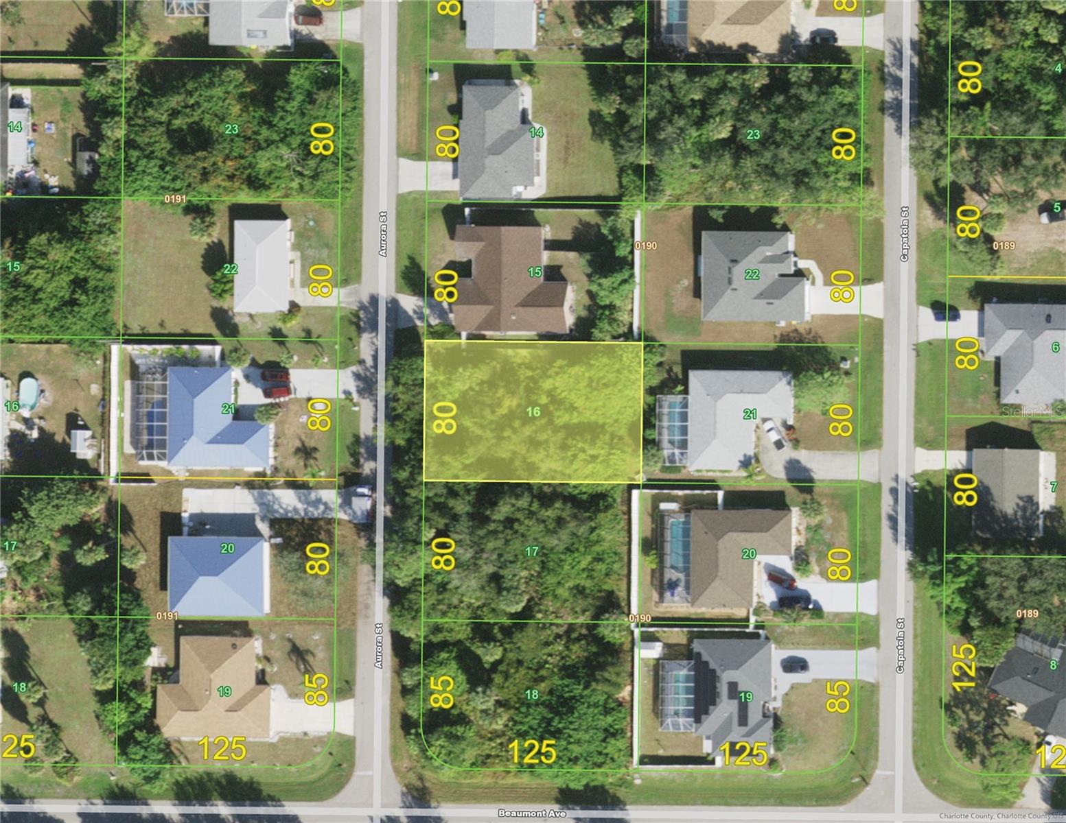 If you like the idea of living in a quiet, peaceful, established neighborhood in a very convenient location with CITY WATER available at a very affordable price, come and check out this nicely wooded lot. It is situated within a short hop to Murdock with shopping of every kind and restaurants for every taste, the mall, parks nearby, boat ramps, the Port Charlotte beach, and even the spring training stadium of the Tampa Bay Rays and Charlotte County fairgrounds. Come take a look at this great spot for your new Florida dream home.