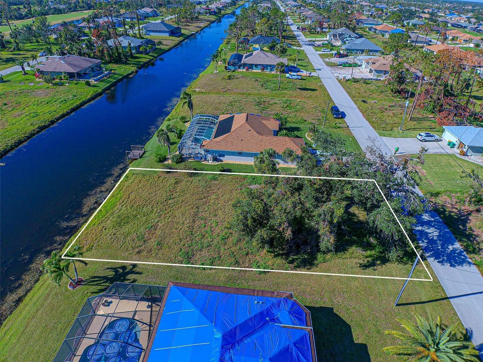 Perfect SOUTH WEST facing WATERFRONT LOT available for sale in desirable West Pine Valley Section of Rotonda. This is the newest section in DEED RESTRICTED ROTONDA with many beautiful new homes being built! Public water and Sewer are available at this property. This perfect lot with serene water views is located close to five Rotonda golf courses totaling 99 holes of fun and challenging play, a beautiful 165 acre Park, featuring a new Community Center, many lakes, abundant tropical landscape and wildlife with miles of biking and walking trails. Take a short car ride to the Gulf Beaches of Boca Grande, Englewood, or Manasota Key to name a few where you will find world class fishing and sand between your toes. Other area amenities include boating, golfing, fine dining, and the Charlotte Sports Park welcoming the Tampa Bay Rays and the Charlotte Stone Crabs. Fly direct into several nearby international and regional airports offering a wide variety of destinations