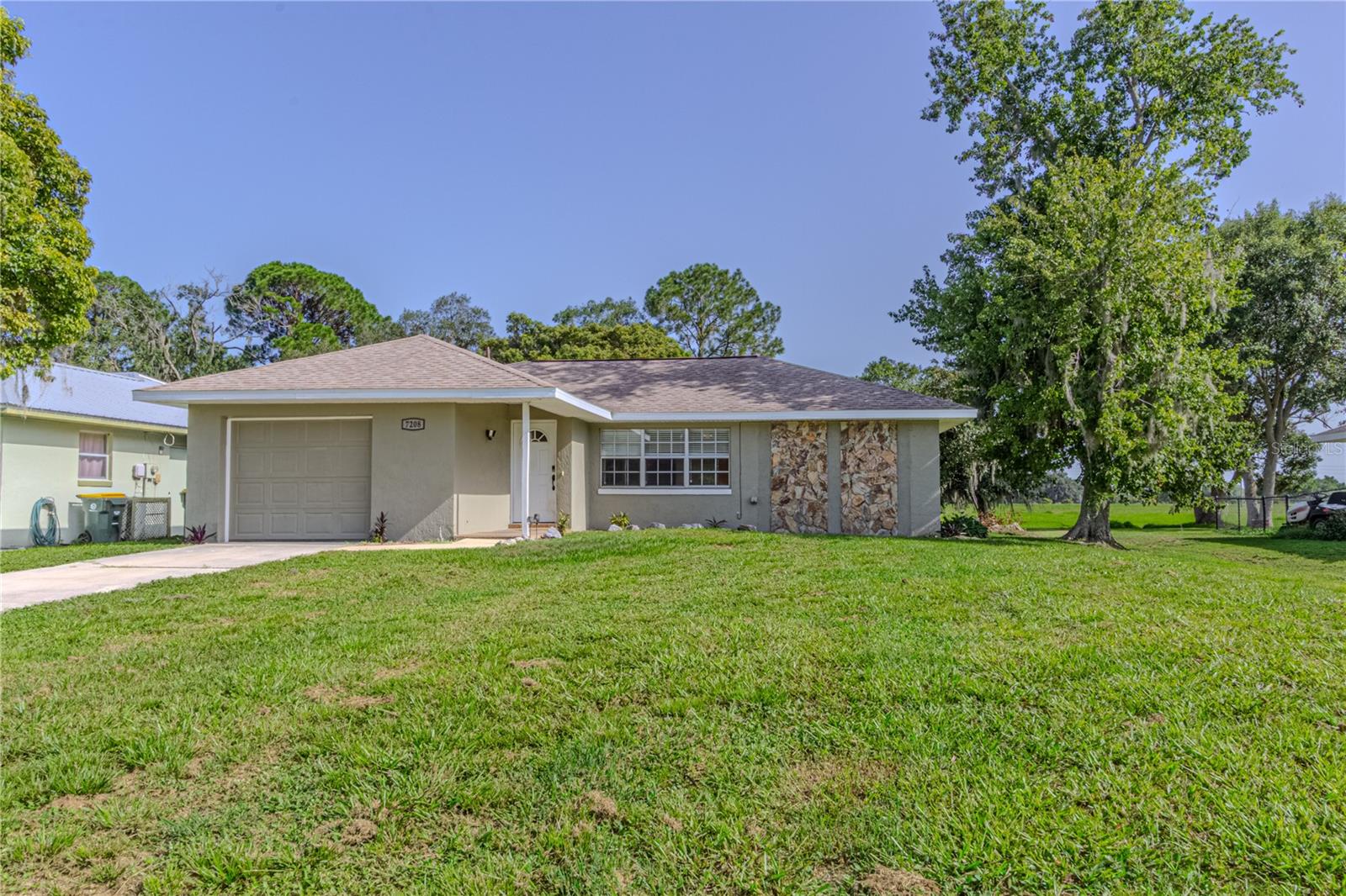 Discover this hidden Gem in Spring Lake Village of Sebring, FL! This exceptional home seamlessly blends comfort and style, poised to become your personal oasis. 2 bedrooms, 2 bathrooms, and a 14,300 square foot very spacious backyard overlooking a serene canal invites outdoor adventures, from crafting a lush garden oasis to designing your dream pool area. Embrace a PET-FRIENDLY lifestyle with the Spring Lake Dog Park, perfect for furry companions to play and socialize. GOLF enthusiasts will delight in the proximity of the renowned Sebring International Golf Resort, practically at your doorstep, as well as PICKLEBALL lovers will enjoy 6 brand new courts IN THE NEIGHBORHOOD. Basketball courts are also present in the neighborhood! Just 10 to 20 miles away from Downtown Sebring, AdventHealth, Walmart, Publix, Walgreens, Dunkin', the scenic Lake Jackson, and a range of everyday conveniences! This property’s prime central LOCATION, versatile layout, and promising neighborhood makes it a perfect choice for homeowners seeking comfort and investors eyeing potential growth. Don't miss out on making this haven your own.
