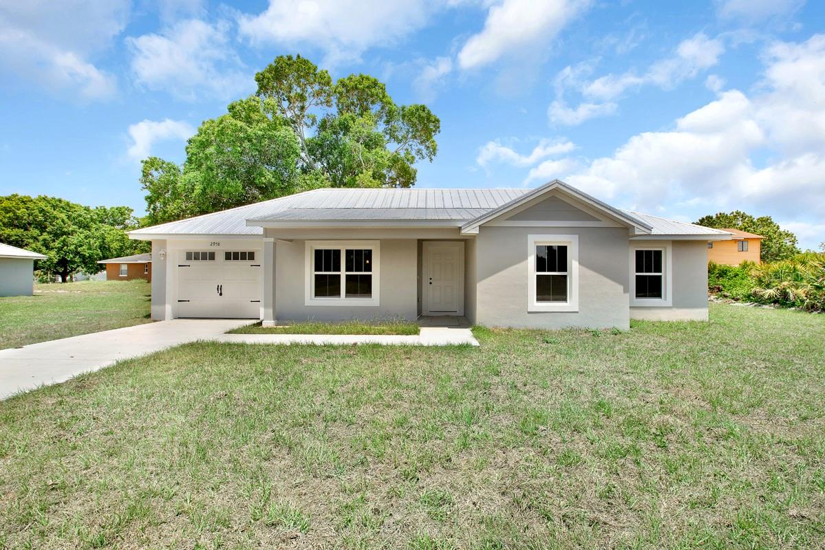 New Construction | 3 Bed | 2 Bath | 1-Car Garage | No HOA | Metal Roof. Brand new, beautifully crafted 3-bedroom, 2-
bath home on an oversized lot. This thoughtfully designed open-concept layout features high-end appliances, premium
finishes, and a metal roof—the gold standard for Florida living. Built for energy efficiency, durability, and low maintenance,
this is affordable luxury at its best. . Don’t miss this beautiful home, just minutes from town Move-IN-Ready in 2/3 weeks.