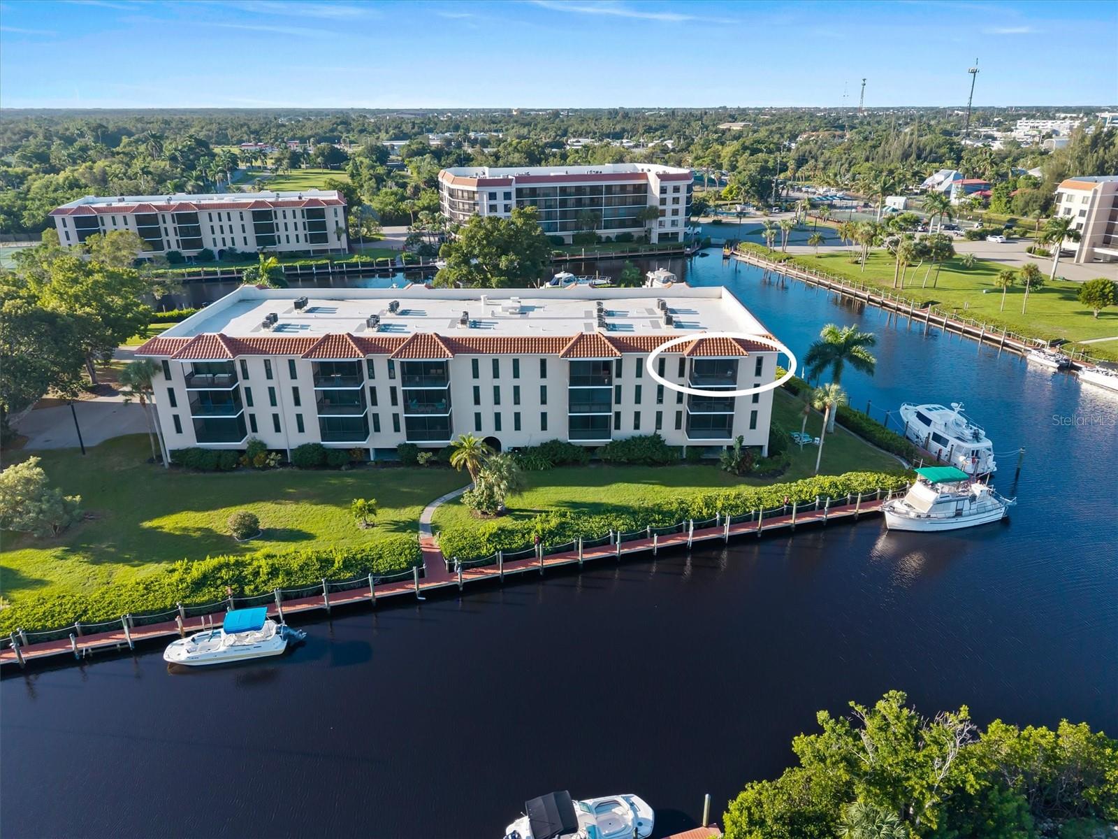 WAKE UP TO WATERFRONT LIVING | EMERALD POINTE RESORT LIFESTYLE | BEAUTIFULLY UPDATED
Discover the waterfront lifestyle at Emerald Pointe, a highly desirable gated community where everyday living feels like a resort getaway! This light, bright, and beautifully updated 2-bedroom, 2-bath end-unit condo captures your attention the moment you walk through the door, with serene Charlotte Harbor water views enjoyed from every room. Wide luxury vinyl plank flooring, fresh interior paint, updated lighting and ceiling fans, new HVAC and a host of 2026 improvements create a welcoming, move-in-ready retreat.  The spacious living and dining areas flow naturally into the updated kitchen, featuring new 2026 appliances. Both bathrooms have also been updated, while new window treatments and a tiled lanai floor add to the home's fresh, polished appeal. The primary suite offers a walk-in closet and en-suite bath. A washer/dryer hookup provides the option for in-unit laundry, with a shared laundry room conveniently located just steps away.
Step onto your private screened balcony and take in the peaceful waterfront setting. Start your mornings with coffee as the sun rises over the harbor, watch boats glide by, or unwind in the evening surrounded by tranquil water views. For boating and fishing enthusiasts, dock space is available based on availability, and the community's private marina offers quick access to Charlotte Harbor.
Thoughtful conveniences include a secured lobby with elevator access, a private storage closet just outside the unit, additional locked shared storage down the hall, three outdoor storage cabinets near your designated parking space, which is located beneath the building. 
The Emerald Pointe lifestyle is where this community truly shines! Enjoy three sparkling swimming pools, tennis and pickleball courts, and an impressive two-story clubhouse featuring a fitness center, game room with billiards and ping pong, library, and on-site restaurant. An active social calendar offers year-round opportunities to connect with neighbors and enjoy community events. Beautifully maintained grounds, a gated entrance, and 24-hour guard service add to the appeal. This community also offers an area to store your boat and trailer when not in use. The monthly HOA covers cable, internet, water, exterior maintenance, professional management, and care of the community grounds, offering a convenient, maintenance-free lifestyle with an impressive collection of amenities right outside your door.  Just minutes from historic downtown Punta Gorda, Fishermen's Village, waterfront dining, local restaurants, farmers markets, live music, golf courses, and scenic walking and biking paths, this location makes it easy to enjoy everything about Southwest Florida. Whether you're searching for a year-round residence or a seasonal waterfront escape, this beautifully updated condo offers the views, conveniences, activities, and resort-style surroundings to make the most of your Florida life. Come discover the Emerald Pointe lifestyle!