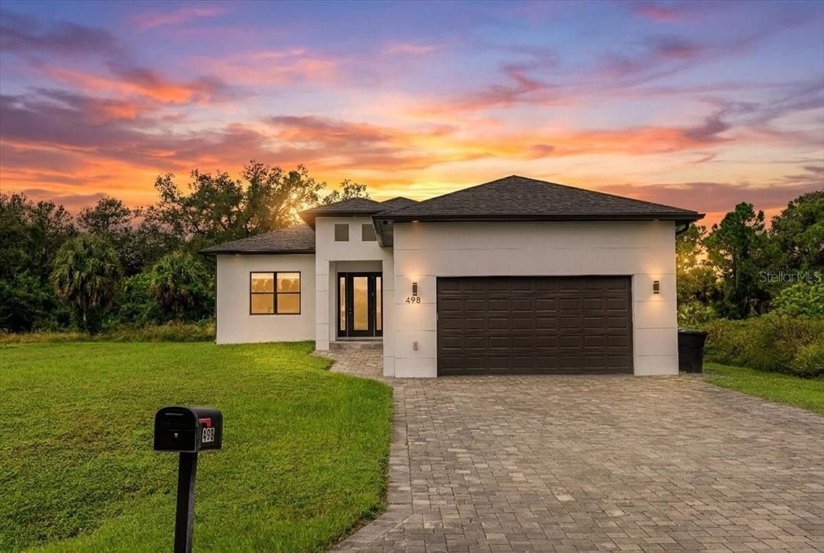 Welcome to 498 Ventura — Where Luxury Meets the Florida Lifestyle!BUILD 2023!STEM WALL CONSTRUCTION!
Discover the perfect blend of luxury, comfort, and Florida living in this stunning custom-built home situated on an 11,100-square-foot lot. Featuring 3 bedrooms plus a dedicated office, 2 full bathrooms, 2 half bathrooms, and a 2-car garage, this exceptional residence showcases outstanding craftsmanship, elegant finishes, and premium upgrades throughout  PLUS FIREPLACE.Seller has approved permit to built the Pool in the back.

From the moment you step inside, you’ll appreciate the spacious open floor plan, soaring ceilings, and beautiful tray ceiling that adds an elegant touch to the home’s inviting living spaces.

The gourmet chef’s kitchen is truly the heart of the home, featuring gorgeous quartz countertops, a distinctive backsplash, stainless steel appliances, abundant cabinetry, a walk-in pantry, and an oversized center island—perfect for meal preparation, casual dining, and entertaining family and friends. The kitchen flows seamlessly into the dinette and great room, creating an ideal setting for everyday living and special gatherings. French doors open to the screened lanai, where you can relax and enjoy the beautiful Florida sunshine and peaceful outdoor surroundings.

The luxurious owner’s suite offers a private retreat, complete with a spacious walk-in closet and an elegant en-suite bathroom featuring dual sinks and a beautifully tiled walk-in shower.

This remarkable home boasts an impressive collection of upgrades, including hurricane-impact glass throughout and a whole-house reverse osmosis water filtration system, providing added comfort and peace of mind.

Enjoy the freedom of no mandatory HOA and no CDD fees, along with a location outside a designated flood zone, as represented by the seller. These desirable features add to the appeal of this exceptional property.

Ideally located just a short drive from the beautiful Gulf Coast beaches, this home provides convenient access to boating, fishing, golfing, shopping, dining, and entertainment. Explore vibrant Downtown Wellen Park, catch the excitement of Atlanta Braves Spring Training, or enjoy the unique experience of Warm Mineral Springs, approximately two miles away. With easy access to I-75 and US 41, commuting and traveling throughout the area are convenient.

Whether you’re entertaining guests, enjoying a cozy evening by the fireplace, or unwinding on your screened lanai, 498 Ventura offers the perfect setting to embrace the Florida lifestyle.

Your piece of paradise awaits! Schedule your private showing today and discover everything this exceptional home .