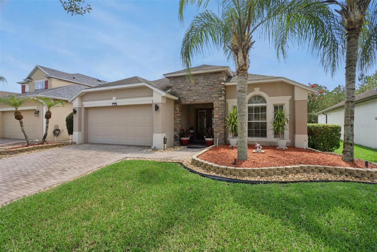 Newly Installed Roof October 2026! Welcome to this exceptional 4-bedroom, 3-bathroom home offering breathtaking and expansive water views in one of East Orlando's most convenient locations. Perfectly positioned on a premium homesite with no rear neighbors, this beautifully maintained residence combines modern upgrades, smart home technology, and peaceful waterfront living. From the moment you enter, you'll appreciate the bright, open floor plan, abundant natural light, and meticulous care throughout. The home features tile flooring throughout the entire home, making it both elegant and easy to maintain. The updated kitchen boasts granite countertops, ample cabinet space, and overlooks the spacious living and dining areas, ideal for everyday living and entertaining alike. The generously sized primary suite provides a relaxing retreat, while the additional bedrooms provide flexibility for family, guests, or a home office. One of the secondary bedroom wings features a convenient Jack-and-Jill bathroom, making it an ideal and functional layout. Step outside to the large covered and screened lanai, where you'll enjoy one of the home's most impressive features, a spectacular panoramic water view that creates a peaceful backdrop for morning coffee, outdoor dining, or simply unwinding at the end of the day. The oversized pond view offers exceptional privacy and beautiful scenery year-round, making the backyard feel like your own private oasis. Technology enthusiasts will appreciate the home's extensive smart features, including smart light switches installed throughout the entire house, allowing convenient control from your smartphone or compatible voice assistant. The home also includes professionally installed hard-wired camera system, providing enhanced security and peace of mind. Located just minutes from Waterford Lakes Town Center, you'll have convenient access to premier shopping, popular restaurants, entertainment, grocery stores, and everyday conveniences. Commuters will love the easy access to State Road 408, State Road 417, and State Road 528, providing quick connections to Downtown Orlando, Orlando International Airport, the University of Central Florida, Research Park, Lake Nona Medical City, and Central Florida's renowned attractions. If you're looking for a move-in-ready home with modern technology, stunning waterfront views, and an unbeatable location, this property has it all. Don't miss your opportunity to own this beautifully upgraded East Orlando home! Schedule your private showing today!