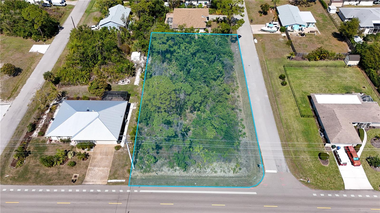 Don't miss out on this rare opportunity to build your dream home on this expansive 18,000 sq ft corner lot, in the highly desirable South Venice area. Properties of this size in such a prime location don’t come available often, making this a standout opportunity for those looking to create something truly special.

With no deed restrictions, HOA, or association fees, you’ll have the freedom to design your ideal home exactly how you envision it! Whether that includes a custom layout, outdoor living space, or a private pool. Additionally the lot is located in Flood Zone X giving you added peace of mind during storm season.

Enjoy a quiet, laid-back setting while still being just minutes from everything that makes the area so desirable. Nearby Shamrock Park & Nature Center offers walking trails, tennis courts, basketball courts, and a playground, while the Legacy Trail provides miles of scenic biking and jogging paths.

You’ll also have convenient access to the South Venice Beach Ferry and Boat Ramp, giving you access to a private beach along the Gulf, perfect for relaxing days in the sun. Just a short drive away, Historic Downtown Venice and Venice Island offer charming shops, local dining, art galleries, and year-round events.

With multiple public beaches close by and endless opportunities to enjoy the Florida lifestyle, this property truly offers the best of location, flexibility, and potential. Don’t miss your chance to secure a piece of paradise in one of the area’s most sought-after communities.
