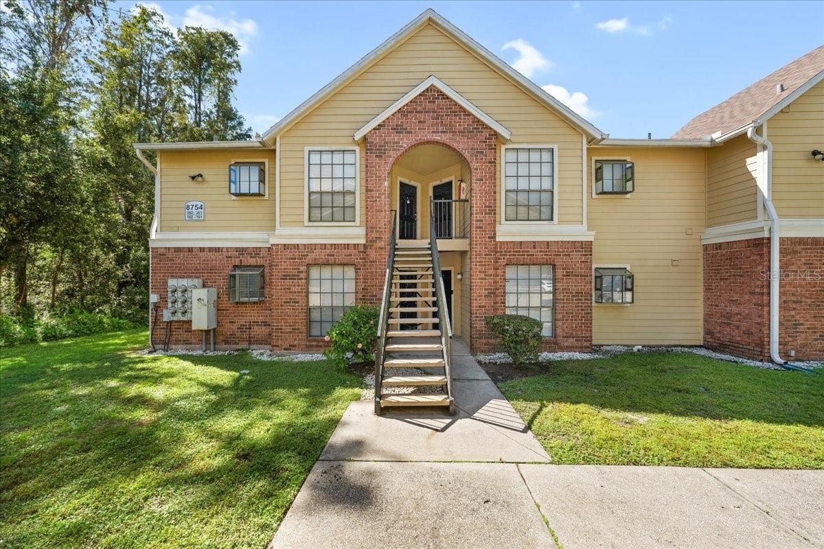 Enjoy comfortable condo living in this second-floor Grand Reserve residence featuring 1 bedroom, 1 bath, and 754 square feet. The unique floor plan offers a spacious living room and bedroom, vaulted ceiling, fireplace, and private balcony with a pleasant view. The kitchen includes appliances, and the unit has washer and dryer hookups. Community amenities include a pool, two tennis courts, jacuzzi, and clubhouse. Conveniently located near Tampa International Airport, Community Hospital, I-275, and the Veterans Expressway. Currently leased for $1,400 per month through February 28, 2027. Buyer must honor the existing lease unless a different arrangement is mutually agreed upon with the tenant.