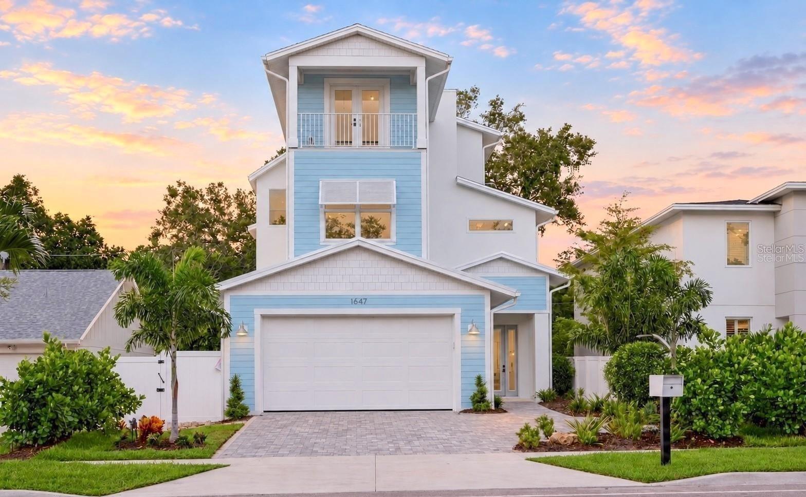 Welcome to this stunning coastal home with elevator, featuring 5 bedrooms, 2.5 bathrooms, and 3,032 square feet of living space. Additional opportunity to add bathrooms with modification add-on with the builder. From the moment you enter, you'll be captivated by the open floor plan, pool view, and fantastic design. This dazzling property, boasts an open floor plan that features high ceilings, natural light, and high-quality finishes throughout.

The home features a modern and elegant kitchen with top-of-the-line Cafe' appliances, quartz countertops, and custom cabinetry. The primary bedroom located on the upper level can be accessed by elevator is a true sanctuary, offering a plush and peaceful retreat It boasts vaulted ceilings, en-suite bathroom that includes a soaking tub and a separate shower that's great for unwinding after a long day. The room also features a generously sized walk-in closet with abundant space for storage and organization as well as a private terrace. On the second floor you will find three vast bedrooms, with plenty of closet space for added convenience and comfort One of the most notable features of the second floor is the sizable sundeck and balcony, which are attached to both bedrooms. The laundry room is conveniently located on the second floor as well. The spacious bonus room offers endless possibilities, from an office, den, playroom, media center or a home gym.

This home has two patios with an outdoor area with a large pool and hot tub that seamlessly blend the indoor and outdoor living with meticulously planned landscaping. Situated between Siesta Key and Downtown Sarasota, you will have easy access to some of the best beaches, restaurants, and shopping in the area. Whether you are looking for a day at the beach, a night out on the town, or a quiet evening at home, this home has everything you need.
