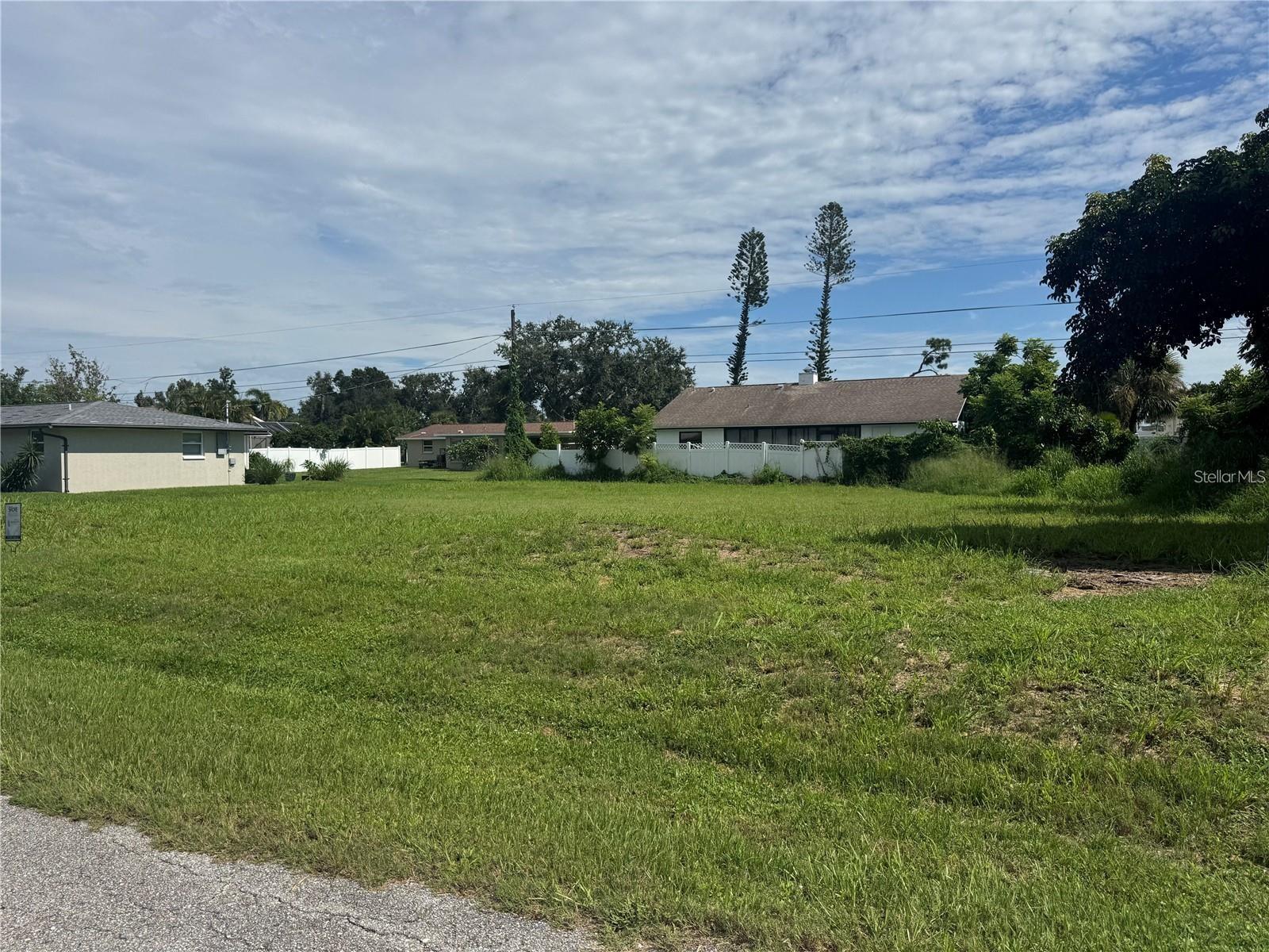 Build your dream home on this oversized 12,000-square-foot cleared lot, ideally located outside of a flood zone. Enjoy the convenience of being just minutes from historic downtown Venice, Gulf beaches, shopping, dining, state parks, and CoolToday Park, the spring training home of the Atlanta Braves.

With no CDD or mandatory HOA fees, you'll have added flexibility while still having the option to join the voluntary neighborhood association, which provides deeded beach access via ferry, a community boat ramp, and a community center for a low annual fee.

Whether you're planning a full-time residence, seasonal getaway, or future investment, this property offers an exceptional combination of location, value, and lifestyle.