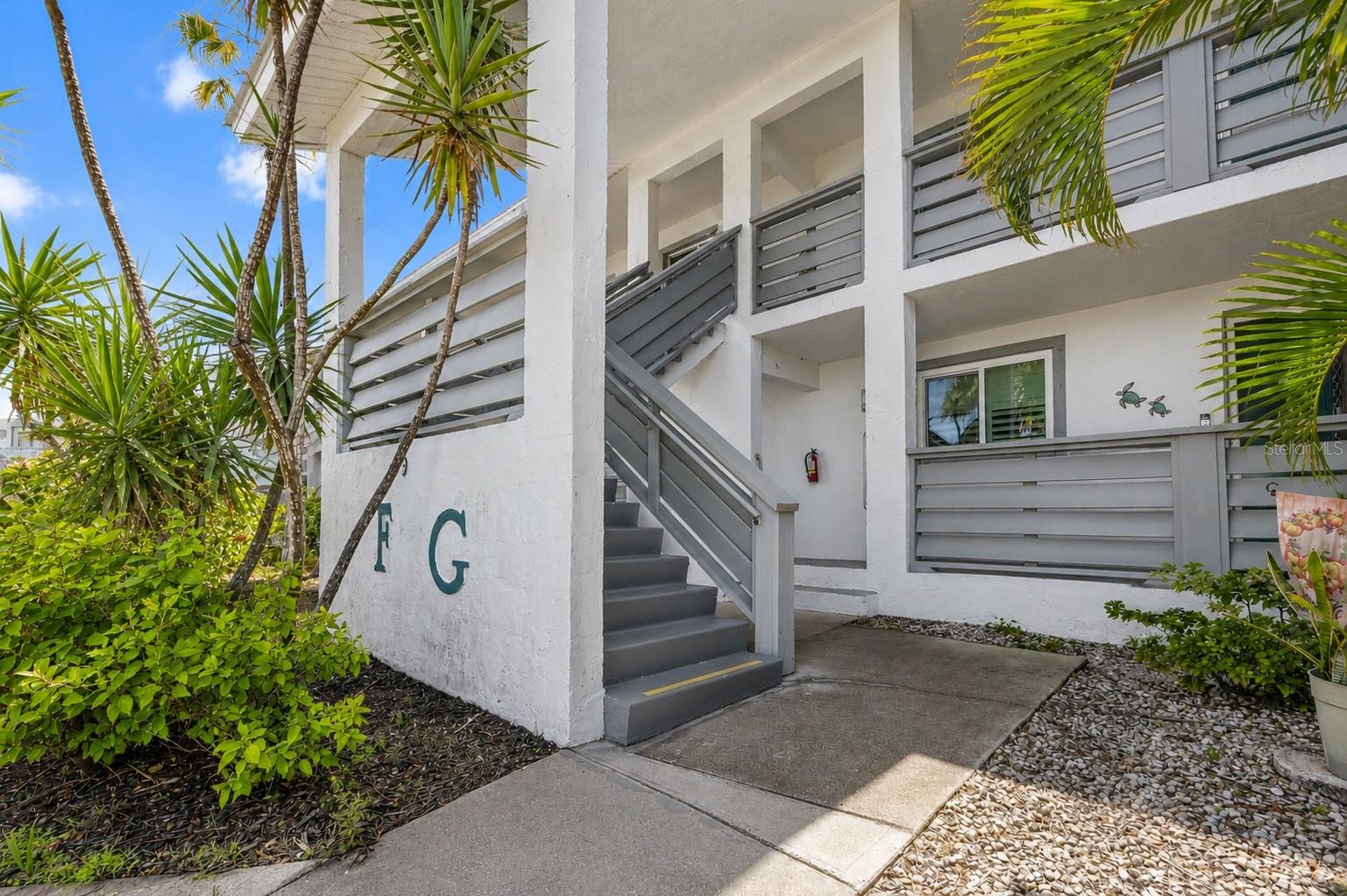 Welcome to Unit 235 of Fiddler's Green in Englewood, Florida! **FULLY FURNISHED AND RENTAL ALLOWED 1 MONTH MINIMUM**  As an investment, or your private home, this beautifully maintained 2-bed, 2-bath turnkey condo radiates ELEVATED COASTAL CHARM.  Walking in you are welcomed by vaulted ceilings that amplify the airy, bright layout, featuring a seamless flow from the kitchen with a high-top breakfast bar to the dining area. ** NEW 2024 A/C WITH ELEVATED CONDESOR FOR EXTRA PROTECTION, NEW 2025 METAL ROOF, 2024 REPIPING (REPLUMB) AND BRAND NEW WASHER AND DRYER **  The private front guest suite offers a walk-in closet and easy bath access, while the serene primary bedroom features a walk-in closet, ensuite bath, and direct slider access to the enclosed balcony. Step outside to your private balcony boasting new flooring, retractable slider shade screens, and lush greenery views. Boating, world-class fishing, championship golf, waterfront dining, shopping, and everything that makes Southwest Florida special are all close at hand. It’s easy to picture yourself here, so come see it today and discover why this Fiddler’s Green Condo Unit 235 could be the Florida escape you’ve been waiting for. Fiddlers Green, enjoys close proximately to the Amberjack Environmental Park and Wildflower Preserve. The easy, elevated Florida lifestyle is waiting and all that’s missing is you.
