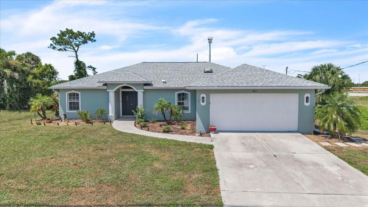 Welcome to this beautifully remodeled 3-bedroom, 2-bath home with an attached 2-car garage, offering 1,609 square feet under air and situated on an oversized .33-acre greenbelt lot in the desirable deed-restricted community of Rotonda Pinehurst. Thoughtfully updated throughout, this move-in-ready property combines a bright, open interior with an expansive backyard and a convenient location near golf, recreation, shopping, boating, and Southwest Florida’s beautiful Gulf beaches. Major improvements provide added peace of mind, including a BRAND-NEW A/C IN 2026 and a NEW SHINGLE ROOF IN 2023. Additional 2023 improvements include new gutters, exterior paint, garage door, lighting fixtures, ceiling fans, flooring, kitchen and bathroom renovations, lanai improvements, and an irrigation system. Step inside to a bright and welcoming open floor plan enhanced by high ceilings and skylights, allowing natural light to fill the living spaces. Updated vinyl flooring extends throughout the living area and all three bedrooms, while the existing tile and grout were refinished for a refreshed appearance. New lighting fixtures and ceiling fans throughout further complement the home’s updated interior. The remodeled kitchen is both stylish and functional, featuring soft-close cabinetry, granite countertops, stainless steel appliances, and a breakfast bar providing additional seating and an easy connection to the main living area. Both bathrooms have also been refreshed with updated vanities and granite countertops. The primary bathroom features a convenient dual-sink vanity, while the primary bedroom offers the added benefit of a walk-in closet. Outdoor living is equally inviting. The spacious 9' x 24' screened lanai was fully rescreened and the floor painted in 2023, creating a comfortable setting for morning coffee, dining, or entertaining. Beyond the lanai, the oversized greenbelt lot provides generous backyard space with plenty of possibilities for enjoying the Florida lifestyle. A separate 10' x 10' paver area offers a dedicated spot for grilling, seating, or an outdoor gathering area. Additional features include an irrigation system, public water and sewer, and a location in Flood Zone X. Rotonda Pinehurst offers a wonderful Southwest Florida setting surrounded by recreational opportunities, including community golf courses, parks, nature and biking trails, tennis and pickleball courts, a playground, and a nature preserve. Enjoy convenient access to the area’s many attractions, with Englewood Beach approximately 8 miles away and Boca Grande approximately 14 miles away, along with nearby shopping, dining, boating, fishing, and everyday conveniences. With its 2026 A/C, 2023 roof, extensively remodeled interior, oversized .33-acre greenbelt lot, generous outdoor living space, and desirable Rotonda Pinehurst location, this home is ready to enjoy as a primary residence, seasonal retreat, or investment property.