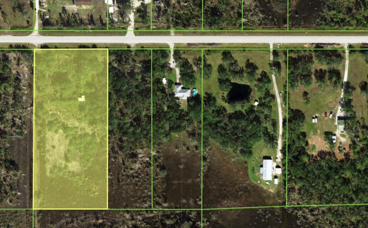 5 ACRES WITH DEVELOPMENT POTENTIAL IN SOUTH PUNTA GORDA!

Discover the possibilities at 30391 Oil Well Road—a spacious 5-acre parcel with privacy, natural surroundings, and valuable road frontage in up and coming South Punta Gorda. With approximately 325 feet of frontage along Oil Well Road and a wooded setting, this property provides plenty of room to create your own private retreat, homestead, or future investment.

The property is zoned AG (Agricultural) and features electricity availability, with septic needed. Previous property information indicates that the front portion of the parcel may have approximately 1.2 acres of buildable area, while wetlands occupy a portion of the southern area. Buyers are encouraged to conduct their own due diligence with Charlotte County regarding zoning, permitted uses, wetlands, environmental requirements, access, and building-site suitability.

Whether you're looking to build, hold for future appreciation, establish an agricultural use, or secure acreage in the Punta Gorda area, this property boasts an exciting opportunity to own a substantial parcel with flexibility and potential.

Conveniently located on Oil Well Road with access toward US-41 and the surrounding Punta Gorda area, this is an opportunity to own 5 acres of Florida land with room to dream and create.

Buyer to verify all zoning, building, wetland, environmental, utility, and development requirements with the appropriate governmental agencies.