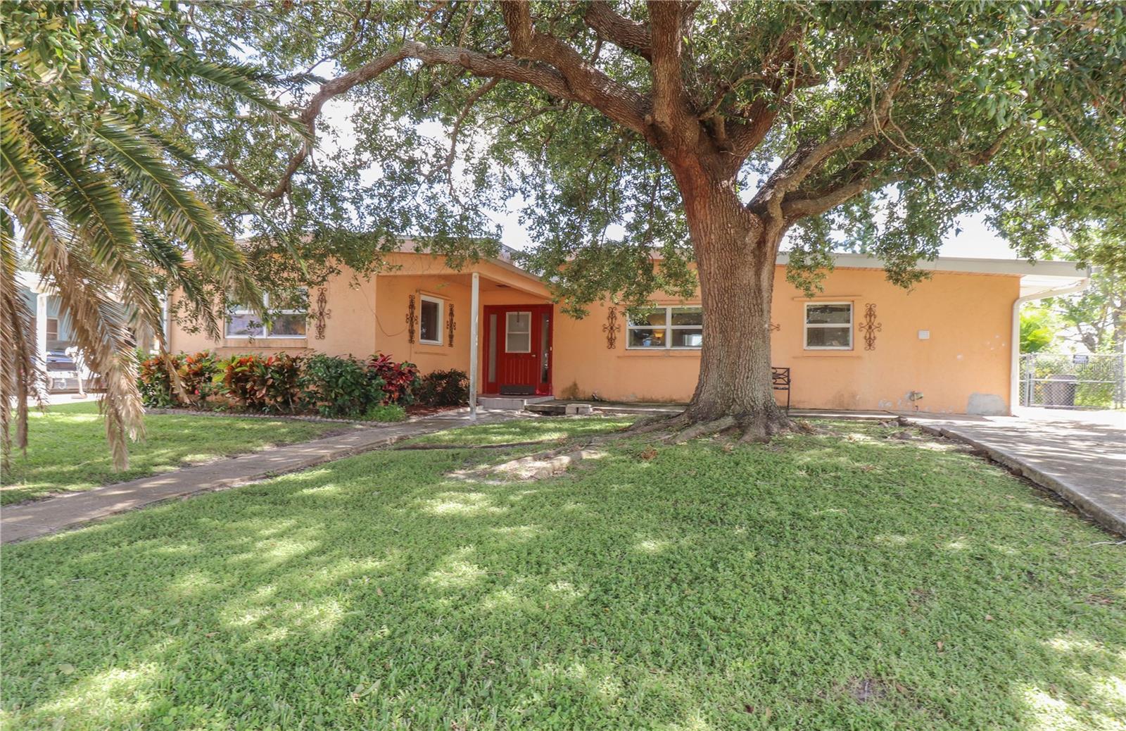 Enjoy Florida waterfront living in this TURNKEY FURNISHED 3-bedroom, 2-bath pool home offering 1,631 square feet of living space on an oversized, fenced lot in North Port! Situated on a saltwater canal with boating access to the Myakka River and only one bridge along the route, this property is ideal for boating enthusiasts, featuring a private dock with electric service and boat davits. Inside, you'll find spacious bedrooms, including a generously sized primary suite featuring two walk-in closets and a private bathroom with convenient access to the pool area. Step outside to your own tropical retreat, where a large in-ground swimming pool and expansive screened lanai provide the perfect setting for relaxing or entertaining. The lanai also features a spacious covered area, ideal for outdoor dining and enjoying the Florida lifestyle year-round. The oversized, fenced lot offers additional outdoor space and includes a storage shed for added convenience. Being sold turnkey furnished, this home offers the convenience of moving right in and immediately enjoying the waterfront lifestyle. Whether you're spending the day on the water, lounging poolside, or entertaining family and friends, this property offers a wonderful opportunity to enjoy the best of Southwest Florida living!
