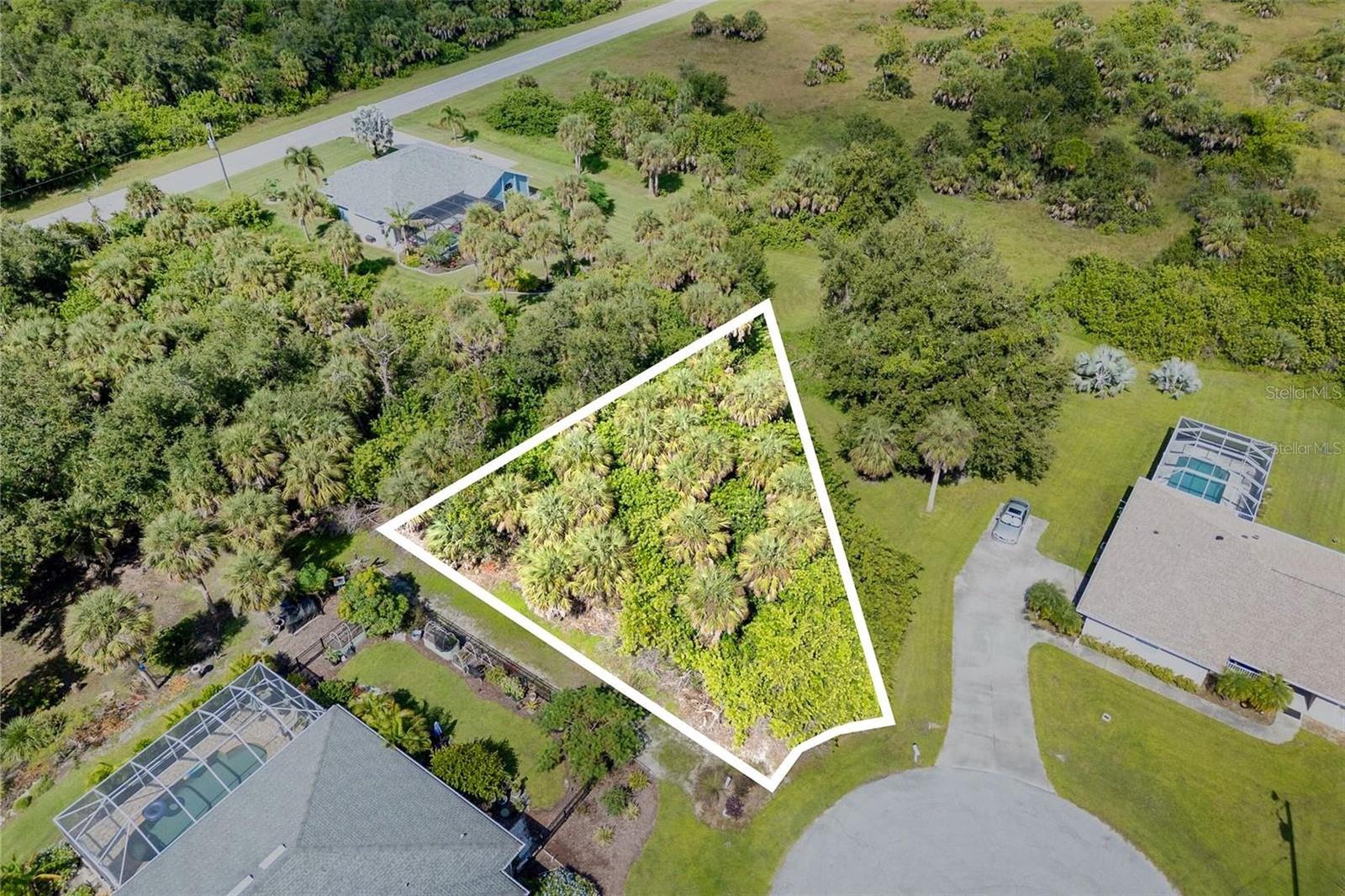 OVERSIZED cul-de-sac lots like this are a limited find in Rotonda West! Build your Florida dream home on this spacious homesite tucked away at the end of a peaceful cul-de-sac in Rotonda Heights, one of the desirable neighborhoods within Rotonda West. Enjoy added space, privacy, and minimal traffic while being surrounded by the natural beauty of Southwest Florida. Located within the Rotonda Heights Conservation Association, this property offers beautifully maintained common areas and low annual fees for a relaxed, low-maintenance lifestyle. The generous lot provides plenty of room to design your ideal home, with space for a pool, outdoor living area, and lush Florida landscaping. Public water, sewer, and electric are available, making this an excellent opportunity to build now or secure your future homesite. Residents enjoy convenient access to nearby parks, golf courses, and walking trails, along with easy access to Gulf beaches, marinas, and the charming coastal communities of Englewood and Boca Grande, offering an abundance of shopping, dining, boating, fishing, and year-round recreation. Whether you’re ready to build today or planning for the future, this oversized cul-de-sac lot offers an ideal combination of space, privacy, and convenience—and a rare opportunity to secure a premium homesite in Rotonda West.