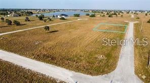Residential vacant lot located in the deed-restricted community of Rotonda Meadows & Villas in Placida. This homesite offers access to public water and sewer services along with a low HOA, making it an excellent opportunity to build a primary residence, seasonal getaway, or investment property. Conveniently located near Gulf beaches, championship golf courses, marinas, boating and fishing, restaurants, and shopping. Enjoy the peaceful surroundings while remaining close to the many attractions and amenities of Southwest Florida.