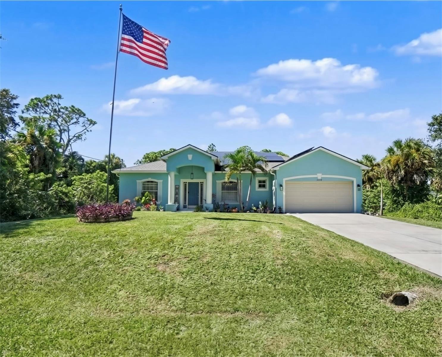 Turnkey Florida oasis featuring 5 bedrooms, 3 bathrooms, and over 2,300 sq. ft. on a 10,375 sq. ft. lot! This spacious home offers an open floor plan, LVP flooring, new bedroom carpet, built-in surround sound, and an updated kitchen with custom pantry cabinetry and convection microwave. The private primary suite features a beautifully renovated bath with a 77” x 48” soaking tub and multi-head glass shower. Enjoy a heated saltwater pool with LED lighting, rescreened lanai with speakers, and permanent holiday lighting. Energy-efficient 46-panel solar system is fully paid off and paired with two backup batteries installed in 2024. Additional features include partial impact windows and a temperature-controlled garage workshop with 24,000 BTU cooling. No deed restrictions—bring your trailers and toys! Convenient to Publix, shopping, gas stations, and I-75. Perfect for families, a vacation home, or investment. Schedule your showing today!