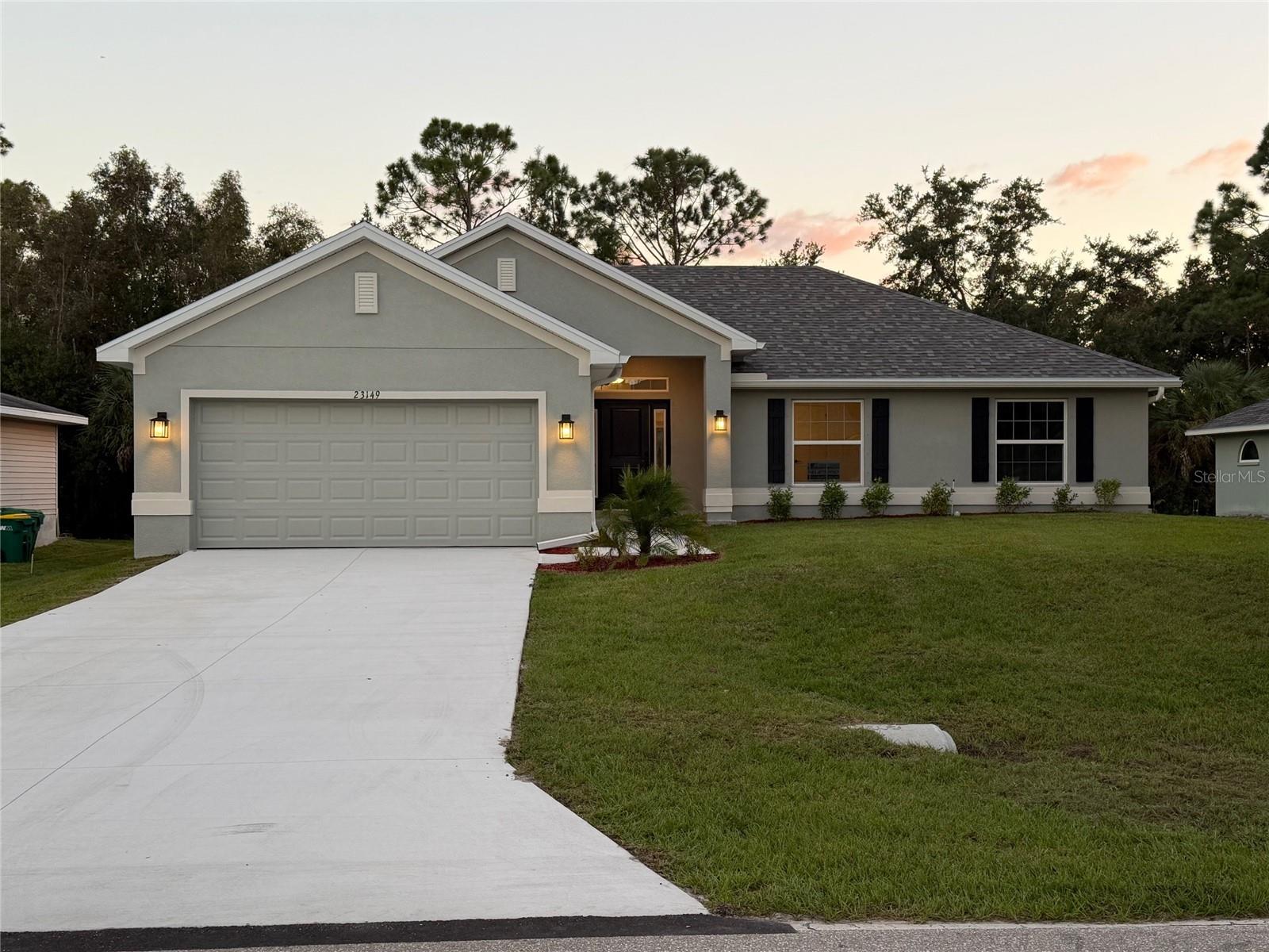GORGEOUS NEW CONSTRUCTION! 4 BEDROOMS, MODERN UPGRADES & FLORIDA LIVING!
Discover the beauty and comfort of this stunning 4-bedroom, 2-bath home Move In Ready Home! Designed with today's lifestyle in mind, this home features: soaring ceilings, elegant contemporary baseboards, and beautiful tile flooring throughout for a clean look.
The spacious kitchen is sure to impress with granite countertops, upgraded cabinetry, and an inviting layout that flows seamlessly into the great room—perfect for entertaining guests or enjoying everyday moments with family and friends.
Retreat to the private primary suite, featuring a beautiful tray ceiling, dual granite vanities, and a spacious 5-foot tiled shower that adds a touch of everyday luxury.
Bring the outdoors in with elegant French glass doors opening to a covered lanai, creating the perfect setting for morning coffee, outdoor dining, or relaxing in the Florida sunshine. Outside, enjoy a beautifully finished homesite with Bahia sod and an irrigation system, plus the convenience of city water. The sidewalk is just across the street. 
Make your new-home dream a reality! 
Ask about current builder flex cash incentives, which change periodically, don't miss valuable savings. When using a preferred lender, the builder covers most closing costs, helping make your move into a brand-new home even more appealing.
Modern style, thoughtful features, and the Florida lifestyle you've been looking for—all in one beautiful new home! ~ Prices are Subject to Change ~~ Subject to Errors & Omissions ~~