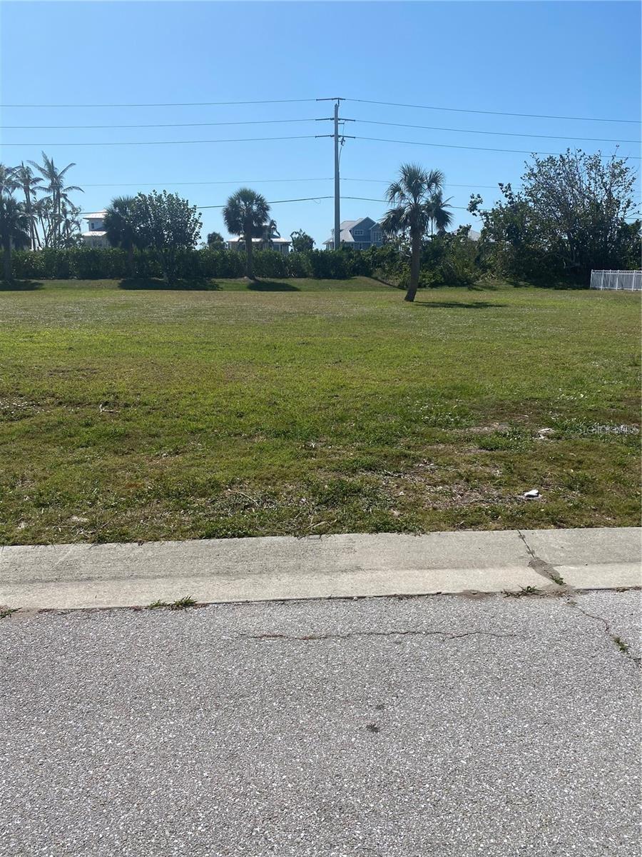 Discover your dream home location just 5 minutes away from the beautiful Gasparilla Island! This spacious 11,619 sqft Lot is situated in a serene condominium community, ofering the perfect blend of privacy and accessibility.
Prime location, only a short drive to the boat ramp and the stunning beaches of Gasparilla Island.