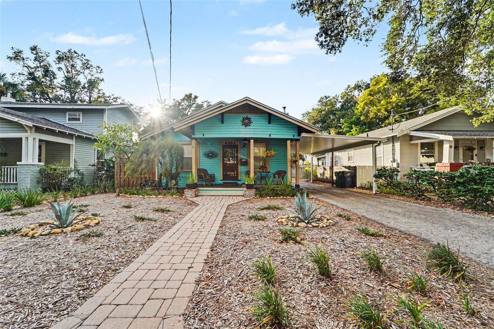 Charming and meticulously maintained 3-bedroom, 2-bath bungalow in the heart of Seminole Heights! This inviting home blends classic character with thoughtful details, featuring a durable metal roof, tile flooring throughout, elegant crown molding, and beautiful trim surrounding every doorway. Additional features include a 1/2-inch plywood subfloor, a meticulously maintained HVAC system, and a convenient full-size indoor laundry area. Step outside to enjoy mature, low-maintenance landscaping and your own backyard retreat featuring a heated above-ground spa. A standout bonus is the approximately 500-square-foot metal garage with two roll up doors, offering excellent space for storage, hobbies, projects, or a dedicated workspace. Ideally located near some of Tampa's best local restaurants, shopping, and the popular Armature Works, with convenient access to Downtown Tampa, historic Ybor City, USF, and I-275. Enjoy the unique charm and convenience of Seminole Heights living in this well-cared-for home. Don't miss your opportunity to make this charming bungalow your own! Book your private showing today!