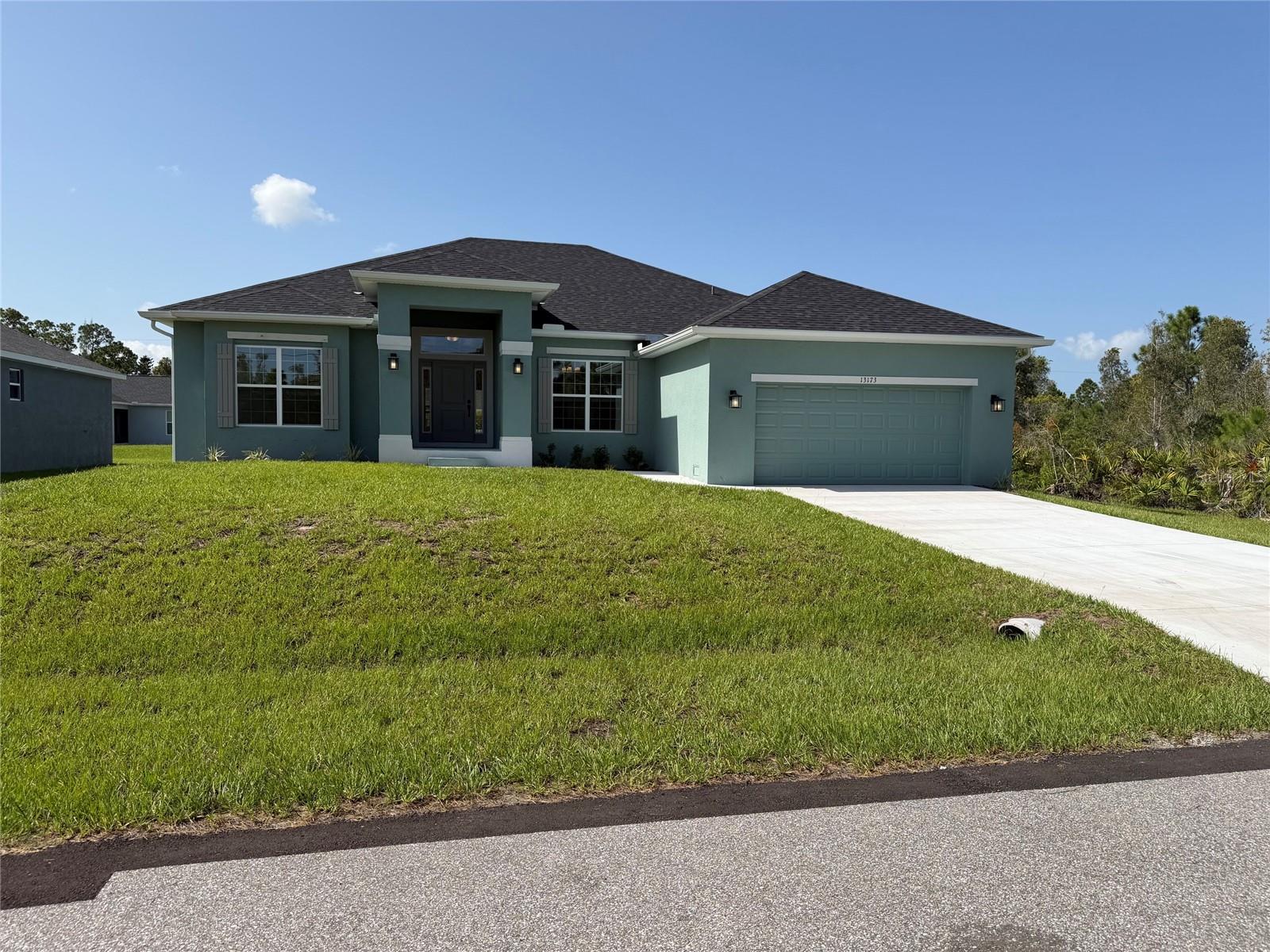 Your Southwest Florida Dream Home Awaits!
Welcome to this beautifully designed new-construction home, where modern comfort meets effortless Florida living. Offering 2,330 square feet of thoughtfully designed living space, this stunning residence features 4 spacious bedrooms and 2 beautifully appointed bathrooms, including a convenient pool bath.
Step inside and experience the refined appeal of Elevation B, thoughtfully enhanced with modern upgrades throughout. The open-concept floor plan creates a bright, welcoming atmosphere, while stylish plank tile flooring flows throughout the main living areas. Two sets of exterior French-glass doors seamlessly connect the interior to an impressive 23' x 8' covered lanai—the perfect spot for morning coffee, relaxing evenings, or entertaining friends and family.
The heart of the home is the beautifully appointed kitchen, featuring timeless granite countertops, upgraded cabinetry, and stainless-steel appliances, including a range, microwave, dishwasher, and garbage disposal. The bathrooms continue the home's elegant, cohesive design with granite finishes and quality upgrades.
Retreat to the spacious primary suite, designed to feel like your own private sanctuary. A distinctive step ceiling adds architectural character, while the en-suite bathroom offers a stunning 5-foot tiled walk-in shower, complete with beautifully tiled walls and flooring.
Outside, enjoy the ease of a professionally finished yard with Bahia sod and an irrigation system, helping keep your lawn lush and inviting year-round. Additional highlights include step ceilings in the bedroom and dining room, city water, and premium upgrades.
And the best part? This home is ready to make your move easier with a convenient Move-In Package that includes a washer, dryer, refrigerator, garage door opener, and window blinds.
Located just a short drive from both local and international airports and close to the shopping, dining, recreation, beaches, and other amenities that make Southwest Florida such a sought-after place to call home, this property offers the perfect blend of comfort, convenience, and Florida lifestyle.
Don't miss your second chance to make this exceptional home yours. Come see it, fall in love, and start living the Southwest Florida dream! All of our New Homes come with a 1 year/2 year/10-year Warranties. Move in Worry free!  ~~ Subject to Errors & Omissions ~~