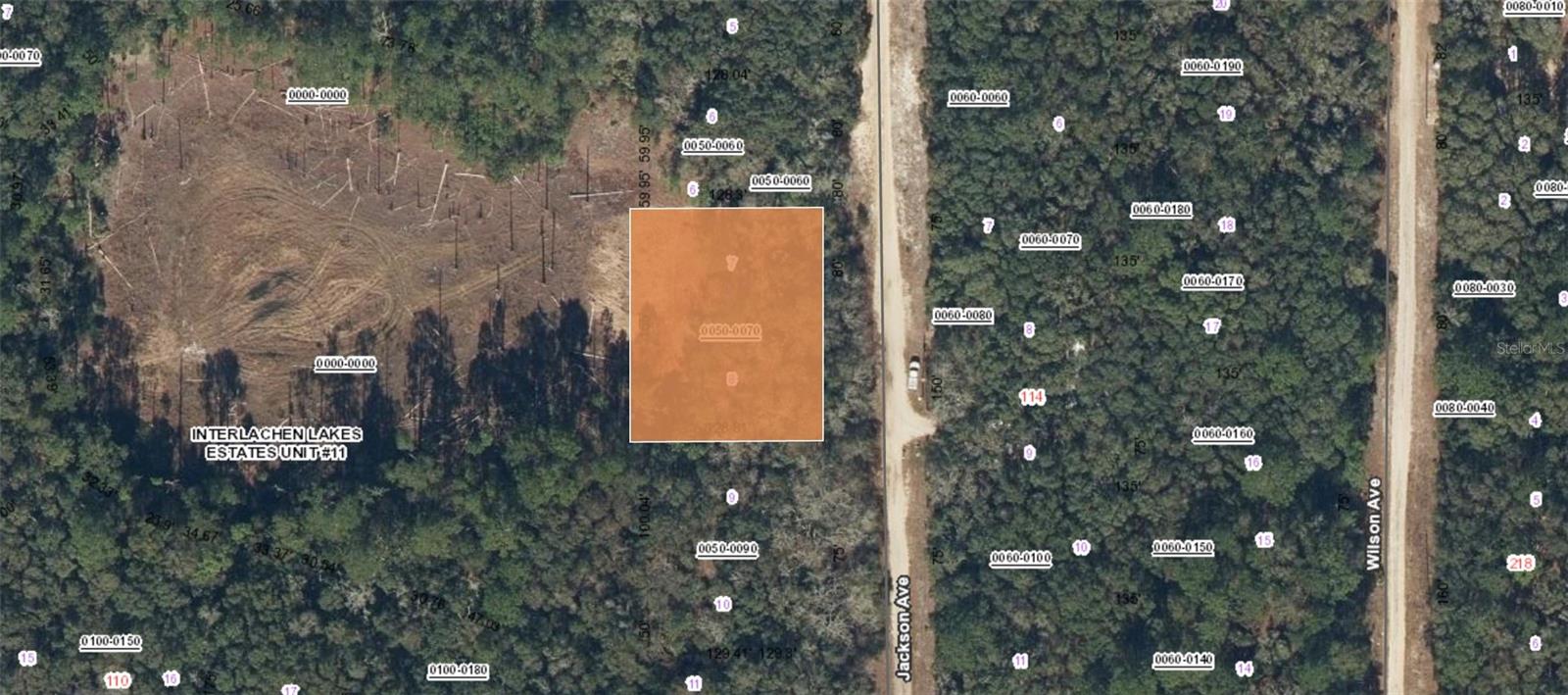 Discover the possibilities with this oversized vacant lot in Interlachen Lakes Estates! Boasting an impressive 155 feet of road frontage, this property offers plenty of space for your future plans and backs to a larger parcel, providing peaceful pond views from the rear.
Conveniently located near State Road 20, you’ll have easy access to neighboring Palatka for shopping, dining, and everyday conveniences. With no build-time restrictions, you have the flexibility to build now, purchase a new property and wait to build later, land bank for the future, or enjoy the property as recreational land.
Whether you’re ready to start your next project or simply looking for an investment in a growing community, this property offers plenty of options. Don’t miss this opportunity to secure an oversized lot with great frontage and scenic surroundings!