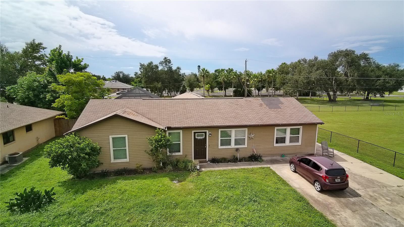 INVESTOR OPPORTUNITY! Currently generating $2,800 per month in rental income—that's $33,600 annually! This spacious 5-bedroom, 3-bathroom pool home in Port Charlotte offers an attractive combination of existing rental income, extensive improvements, and long-term investment potential. Situated on an approximately 0.23-acre lot with a garage, the property has undergone substantial renovations, including many of the big-ticket improvements investors look for. Updates include new plumbing supply and drain lines, upgraded electrical with a 200-amp Square D panel, new HVAC system and ductwork, added wall and ceiling insulation, hurricane windows, and a new water heater. Inside, the home features new flooring throughout, updated doors and hardware, a remodeled kitchen with new cabinetry, countertops, and appliances, and renovated bathrooms with updated vanities, tubs, showers, and fixtures. The generous five-bedroom layout, additional bonus spaces, and private swimming pool provide desirable features for attracting and retaining tenants. The property does need a roof replacement and minor vinyl siding repairs in two areas, offering an opportunity for an investor to complete the remaining improvements while benefiting from the extensive renovations already completed. Conveniently located near shopping, dining, boating, fishing, golf, and Gulf Coast beaches, with easy access to Punta Gorda and surrounding communities. With $33,600 in annual gross rental income already in place, this is an opportunity to acquire an income-producing property without starting from scratch. Whether you're expanding an established rental portfolio or purchasing your first investment property, this one is worth a closer look. Schedule your private showing today!