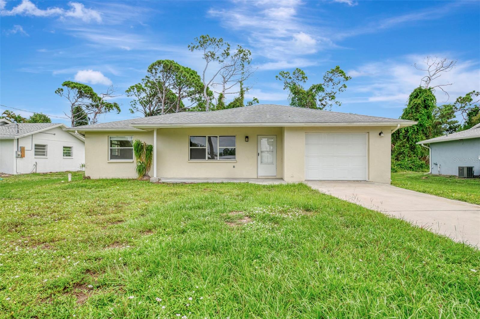 Welcome to this quaint property nestled at the end of a tranquil cul-de-sac in the heart of Englewood. Pull up the driveway to be met with a cute and cozy 2-bedroom and 2-bathroom home. As a bonus, owning in this community also allows you the ability to join the Englewood Beach Club!  Entering through the covered front porch, you'll be delighted with the abundant natural light that fills the home. An open front porch is the perfect spot to sit and enjoy your morning coffee and the nice weather of Southwest Florida. Step up to your front door and as you open it you are met with a nice-sized living room and dining room combo, complete with large front windows and an abundance of natural light.   In the updated kitchen, you'll find tasteful cabinetry, ample cabinet and solid countertops, and new appliances.  There is a generously sized utility room that serves as a laundry room.  From the dining area you have access to sliding glass doors to enter your screened in porch.  The primary bedroom is large with built-in closet and its private bathroom.   The second bedroom has built-in closet. The guest bathroom is off the living room for convenience when entertaining guests.  The backyard offers the perfect spot for a pergola, an outdoor playground or your own designed oasis. Bring your boat, RV, beach toys and the family to enjoy this paradise.  You'll enjoy the peace and tranquility all while being close to the local amenities including dining, shopping, medical facilities, and of course the gulf coast beaches, with Englewood Beach only a few miles away! Centrally located between Sarasota & Punta Gorda airports makes for easy travel opportunities.