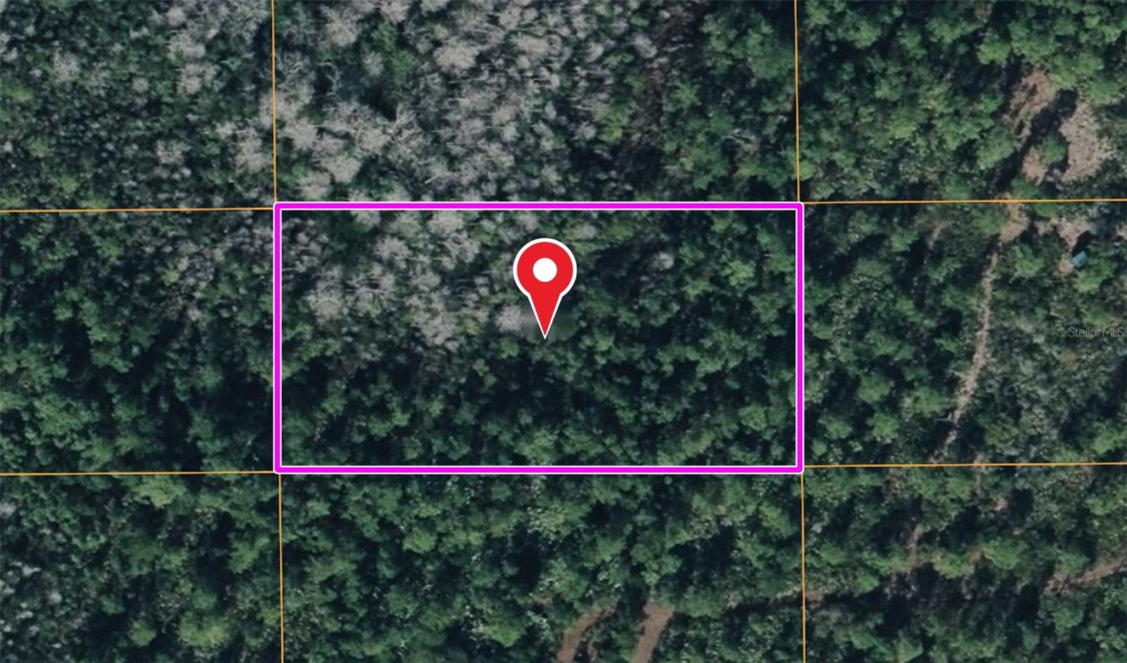 1.26 ACRES EAST ORLANDO — RAW INVESTMENT LAND

Raw, wooded A-2 (Farmland Rural) acreage in Orange County Acres, East Orlando (32820). 1.26 acres, approximately 54,735 sq ft. No HOA. Parcel ID 24-22-32-6214-03-820.

RAW LAND — NOT BUILD-READY: No utilities and no road improvements are in place — no water, sewer, or electric to the parcel. It is not set up to place a home or trailer as it sits; building would require bringing in a well, septic, and power, plus improving access. Buyer to verify buildability, permitted uses, utilities, wetlands, flood zone, zoning, and all development feasibility with Orange County.

INVESTMENT: A low-cost basis for a long-term buy-and-hold in the growing East Orlando corridor — an area that has drawn interest from land investors holding multiple parcels. No utilities are needed to land-bank it. Priced to sell. Potential for long-term appreciation if the surrounding area develops over time; no guarantee.

RECREATION: The surrounding area is reportedly used for hunting and off-road riding (ATVs/motorcycles); the seller has not visited the property and makes no representation about recreational use of this parcel or any surrounding land.

ACCESS: The parcel is interior and does not front Dill Rd — the county lists Dill Rd as a reference address only. Access is by a recorded 25-ft ingress/egress easement along the east boundary, currently unimproved. High-clearance or off-road vehicle recommended; the site may not be driveable.

FLOOD: The parcel lies partially within FEMA Flood Zone A (a special flood hazard area) and partially within Zone X. Wetlands are present.

Any site visit is at the buyer's and agent's own risk; seller accepts no responsibility for site access or conditions. Cash preferred; owner terms may be available to a qualified buyer. Sold AS-IS.