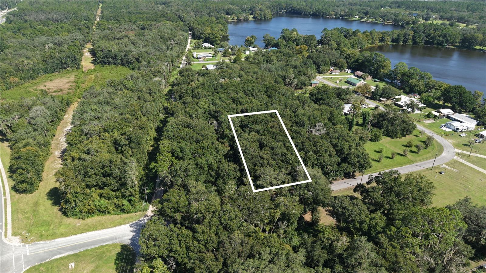Prime 0.26-acre residential lot in Interlachen, Putnam County, located at 104 Twin Lake Grove Dr. This vacant residential parcel offers an opportunity for a future homesite or land investment, subject to applicable zoning, access, utility and development requirements.

The property is located in Flood Zone X, identified as an area outside the 1 percent and 0.2 percent annual-chance floodplains based on the provided FEMA data. No wetlands are reported in the supplied property information. Buyers should independently verify current flood zone information, wetlands, drainage conditions, environmental requirements and any applicable restrictions.

The property is situated near local amenities, including Hitchcock's supermarket, Interlachen High School and Dowda Park. Distances are approximate and should be independently verified.

Buyers should verify zoning, permitted uses, setbacks, utilities, road access, building requirements, minimum lot requirements and all other development regulations with Putnam County and the appropriate authorities before purchase.

The property is available for a self-guided tour. Subleasing is not permitted. This property is not available for rent or lease.