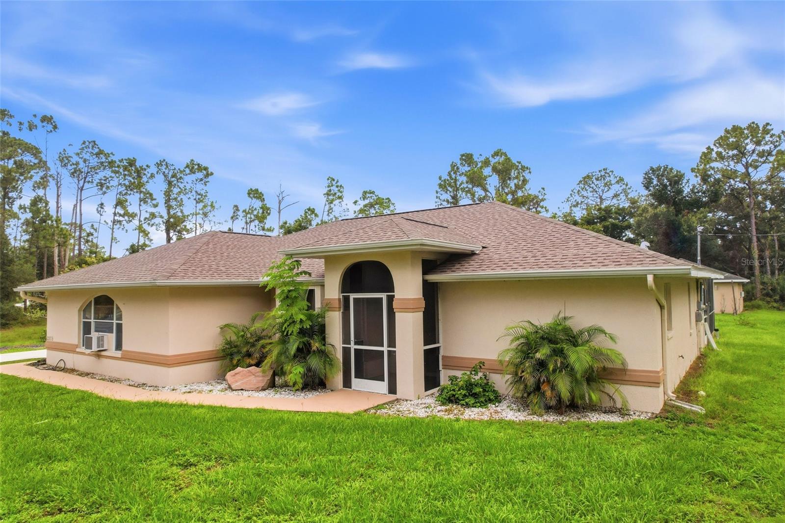 Discover the lifestyle you've been dreaming of on this beautifully updated 3-acre property in North
Port Estates. Bring your horses, animals, and outdoor hobbies—this property offers the space and
flexibility to enjoy them all. Whether you're gathering with friends by the heated pool, tackling
your next project in the detached 30x30 concrete block garage, or simply appreciating the peace and
open space, this property is designed for living, working, and playing. Conveniently located just
minutes from shopping, dining, I-75, CoolToday Park, Myakkahatchee Creek Environmental Park, and
the future Sarasota Memorial Hospital campus.
Inside, you'll find over 2,000 square feet of thoughtfully updated living space featuring a 2023
roof, 2025 re-piped plumbing, new well pump, waterproof laminate flooring throughout, fresh paint,
crown molding, updated lighting, and a beautifully remodeled kitchen with wood cabinetry, solid