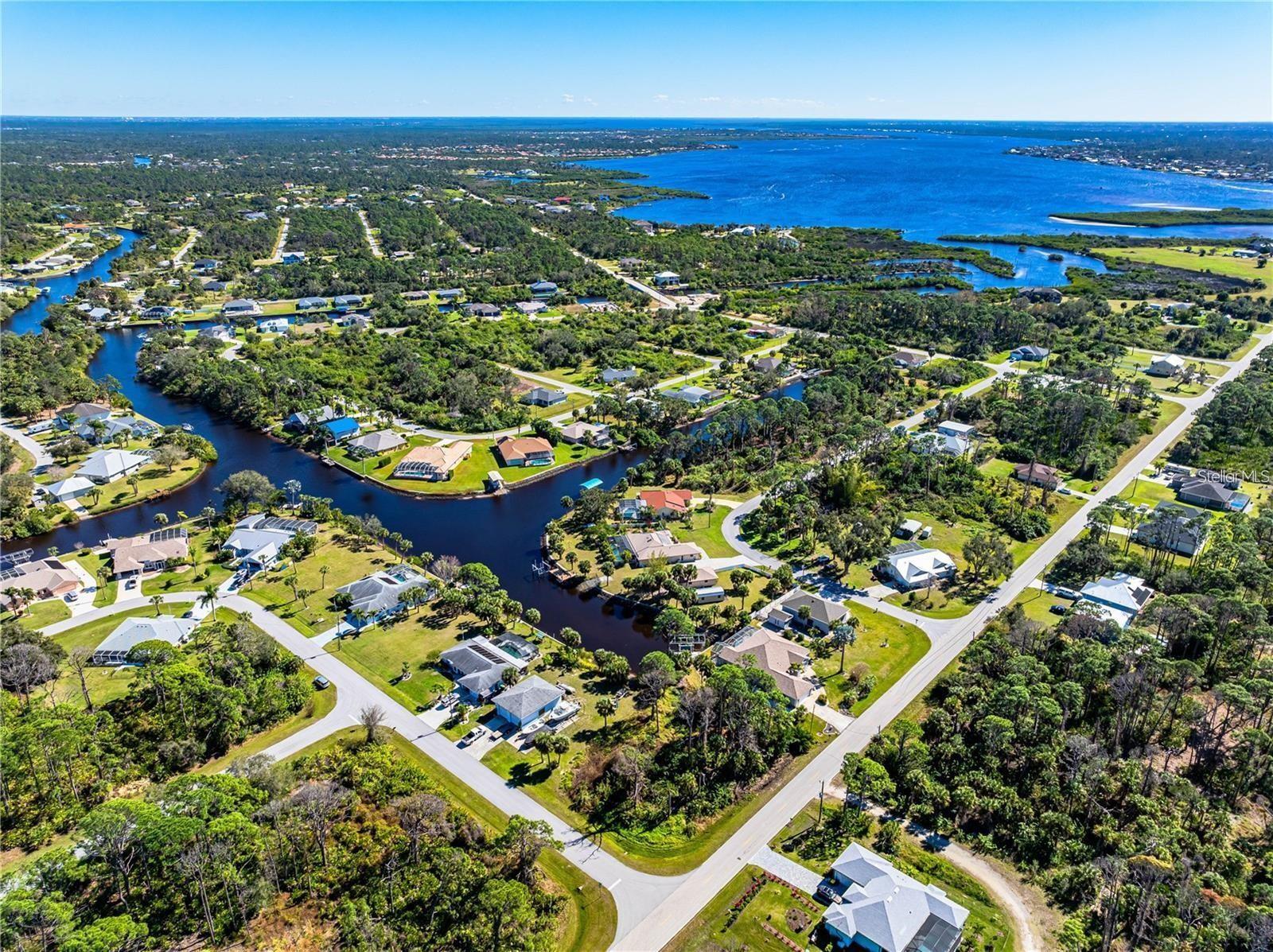 Oversized waterfront, corner lot! This half-acre property offers so many possibilities. Experience the leisurely activities of fishing, boating and breathtaking views directly from your backyard! Waterway access, leading to the Myakka River! Enjoy some of Florida’s beauty at its finest, from the convenience of your home.