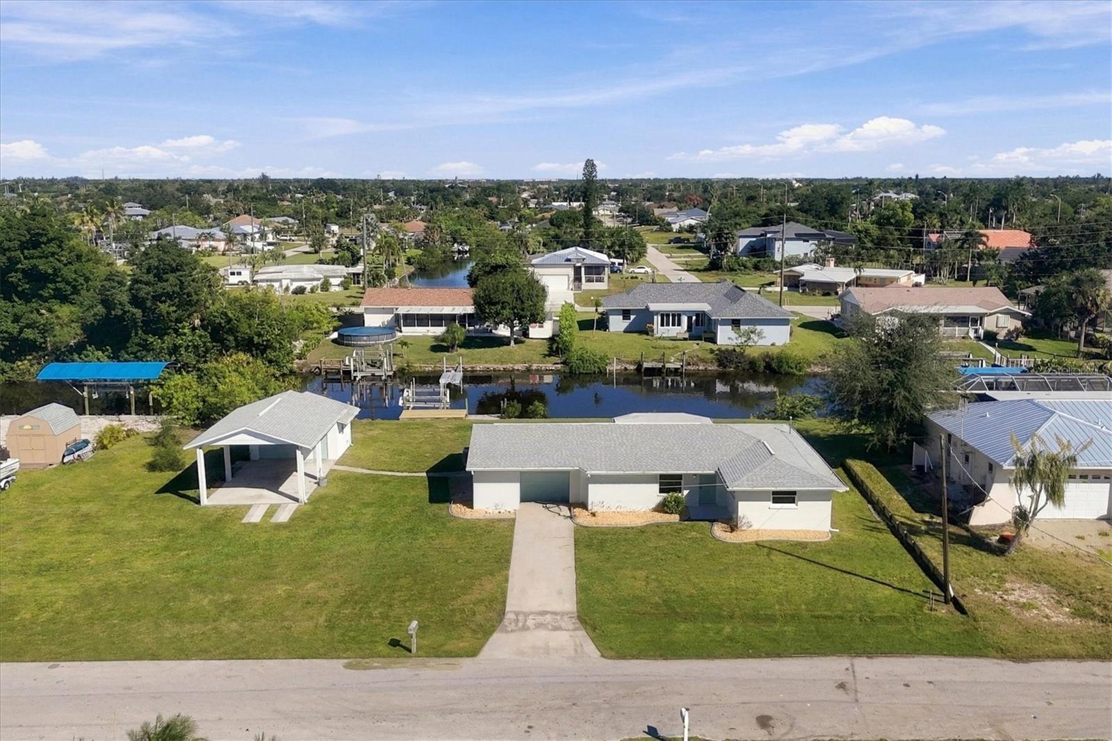 Beautifully renovated waterfront property offers the perfect combination of modern upgrades, functionality, and Florida waterfront living. 
Enjoy peace of mind with extensive improvements, including new AC, completely updated electrical throughout including a brand new electrical panel, all new water supply and drain lines, roof 2022. Fully remodeled interior featuring solid wood cabinets, quartz countertops and stylish finishes throughout. 

Need room for your vehicles, hobbies, or projects? This double lot gives you ample space with the addition of a detached building with a dedicated workshop providing exceptional versatility and storage space and additional parking.

Step outside and enjoy an impressive 150ft of water frontage with your own private dock, perfect for relaxing by the water and enjoying the Florida lifestyle. 

With major upgrades already completed, beautiful interior finishes, generous waterfront frontage, plenty of room for your toys and projects, this property is a rare find.