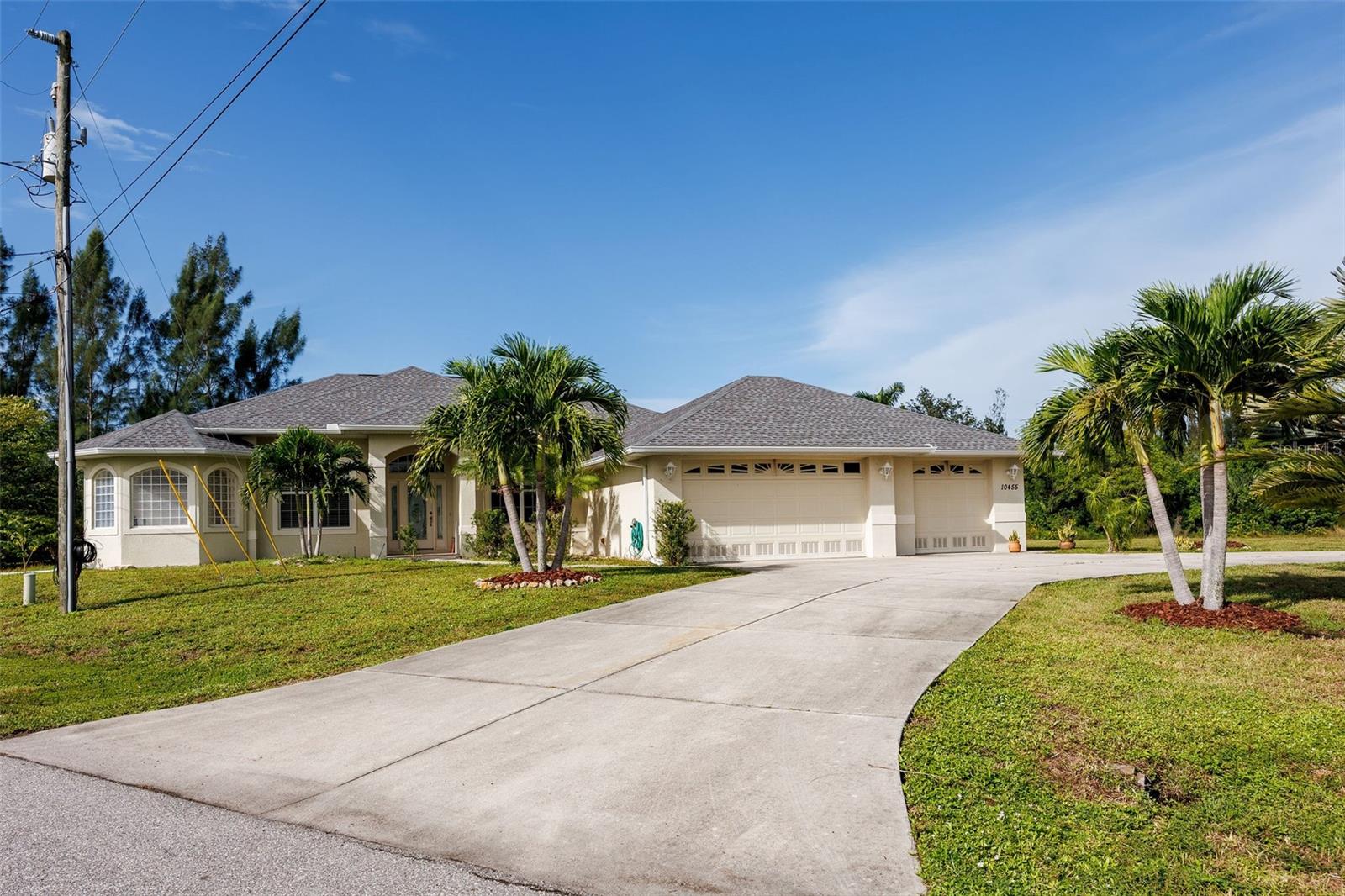 WATERFRONT ESTATE ON A TRIPLE LOT WITH 130 FEET OF CANAL FRONT ON THE RIVERSIDE WATERWAY. COVERED BOAT LIFT.  3 BEDROOM, 2.5 BATH , 3 CAR GARAGE. VERY WELL MAINTAINED HOME ON A HUGE CORNER LOT.  FEATURING A LIVING ROOM, FAMILY ROOM, DINING ROOM AND OFFICE.  VAULTED CEILINGS THROUGHOUT. SPEAKERS THROUGHOUT. GAS STOVE AND FIREPLACE. BONUS SAFE ROOM IN GARAGE WITH A/C. BEAUTIFUL POOL AND LANAI WITH OUTDOOR SHOWER, POOL BATH AND GAS FOR AN OUTDOOR KITCHEN OR GRILL. LUSH TROPICAL LANDSCAPING. CIRCULAR DRIVEWAY. PRICED TO SELL. CALL FOR A PRIVATE SHOWING.