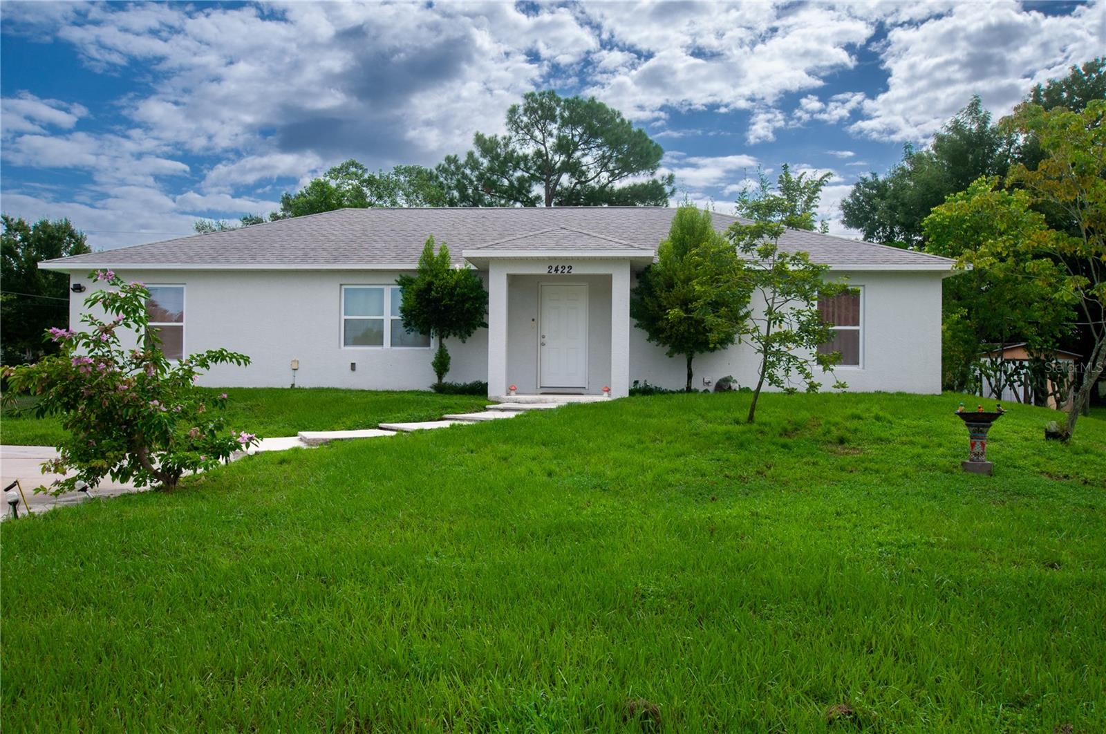 Welcome home to 2422 SW Alice Ave, a beautifully built 2022 residence offering 4 bedrooms and 2 full bathrooms, situated on a spacious 0.303-acre lot in the heart of Arcadia, Florida. As one of the newer homes in the area, this property combines modern construction, energy-efficient building standards, and low-maintenance living — all without the wait or premium of building new.

Step inside to find a thoughtfully designed layout that offers comfortable living for families of any size. The four bedrooms provide flexibility for a primary suite, children's rooms, a home office, guest space, or a workout room — whatever fits your lifestyle. The two full bathrooms add everyday convenience for busy households.

Outside, the nearly one-third-acre lot is one of this home's standout features. Enjoy plenty of room to garden, entertain, add a pool, park an RV, boat, or additional vehicles, or simply give kids and pets space to roam. In a market where large usable lots are increasingly hard to find, this property offers rare space and flexibility close to town.

Arcadia offers small-town charm with everyday convenience — this home is just minutes from local schools, shopping, dining, and the historic downtown Arcadia district known for its antique shops and community events. Whether you're a first-time buyer, growing family, or investor looking for a newer-construction property with land, 2422 SW Alice Ave checks the boxes.

Don't miss the opportunity to own a nearly new home on a spacious lot in a great Arcadia location. Schedule your private showing today!