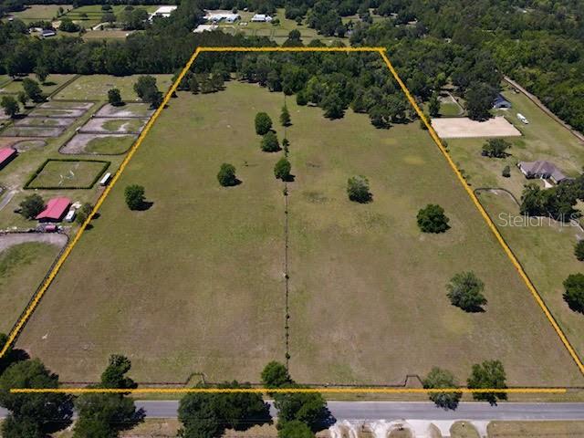 Tucked away on a beautifully canopied and quiet street in the heart of Ocala’s prestigious NW horse country, this 20+ acre property offers the perfect blank canvas to bring your dream farm to life. Surrounded by some of the area’s top training facilities and competition venues, you’ll be ideally positioned between the World Equestrian Center (8.5 miles) and HITS (4 miles). With two separate parcels included, there’s flexibility to build exactly what you need—whether that’s a private training operation, a peaceful retreat, or a world-class equestrian facility.