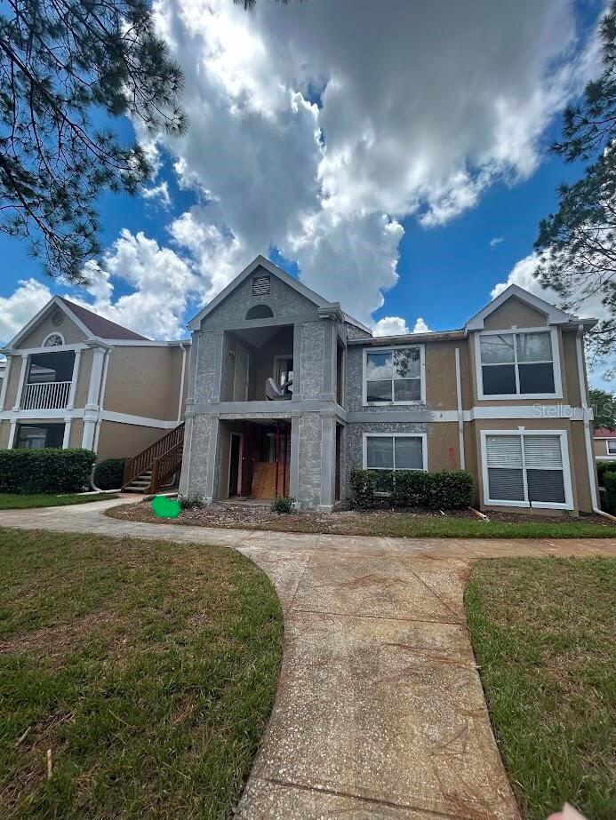 Welcome to this inviting condominium in the heart of Tampa, FL. This charming unit features a spacious layout with modern amenities and plenty of natural light. Enjoy the serene views from the private balcony, appropriate for relaxation. The community is located in the north side of flatwoods park, a huge forest and lots of lakes surrounding area. It has excellent facilities including a pool, fitness center, and clubhouse. Conveniently located near shopping, dining, and entertainment options, this property is a great place to call home. Don't miss the opportunity to experience comfortable living in a vibrant Affordable living in an exclusive area of New Tampa in this two bedroom, one bath 2nd floor condo. HOA just finished the outside balcony and roof repairs plus all the stud wood on the balcony surrounding replaced. Huge and expensive project makes the house more valuable. Highland Oak is a condominium community with a 24-hour manned guard gate in the Hunter's Green golf community. Great for a first-time home buyer. Enter to the large living room featuring tile flooring and sliding glass doors to the screened and covered patio. The master bedroom is large and has a walk in closet. The bathroom has a large soaking tub and separate shower as well as a dual sink vanity. The second bedroom has laminate flooring as well. The community has a pool, fitness center, and community center, as well as access to the amenities in Hunter's Green, including the tennis course, football course, baseball, basketball, golf course and long walk trails, all forest surrounding Centrally located in New Tampa, enjoy access to numerous shopping areas and great restaurants. Don't miss out!
