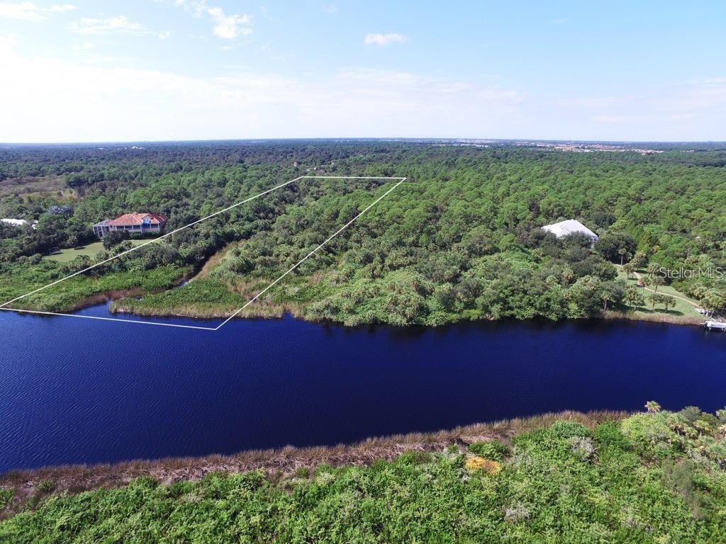 Exceptional opportunity to own over 8 acres in the gated Myakka River Trails community in Venice. Private estate-style setting with paved roads, mature natural landscape, and peaceful Old Florida surroundings. Ideal for a custom home or investment opportunity. Well and septic required. Buyer and buyer’s agent to independently verify zoning, utilities, flood zone, environmental conditions, HOA information, wetlands, and all building requirements.