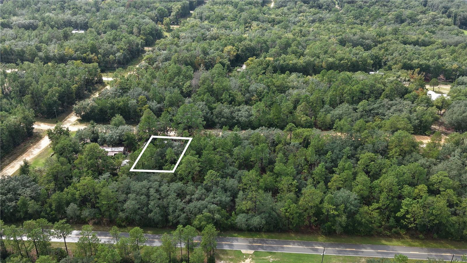 Excellent 0.22-acre residential land opportunity at 604 Del Monaco Ave in Interlachen, Putnam County, offering approximately 9,583 square feet of land with several existing improvements that add functionality and established features to the property. Approximately 80% of the lot has been cleared, and the property is fenced, with an established mailing address and a temporary power pole already in place (not connected).

The property features a 12' x 18' lofted barn shed with insulation, electrical wiring, water piping, air conditioning, and an on-demand hot water heater.

Additional site improvements include a water tank on the premises that was recently filled, an established garden with a dedicated workspace, a compost pile, and a 100-gallon rain barrel. The property also features a built-in fire pit and BBQ area, providing designated outdoor spaces for recreation and practical use.

Located within Interlachen Lakes Estates, Unit 16 Frederick Town, the property offers convenient access to outdoor recreation, nearby lakes, and local amenities. Lake Grandin and Lake Ida are just minutes away, offering opportunities for fishing, boating, and other water activities, with docks and boat ramps in the surrounding area. Lake Grandin is also within biking distance, making it an appealing destination for outdoor enthusiasts. The property's location provides access to St. Augustine, Gainesville, and Ocala, offering a balance of peaceful surroundings and connections to some of North Central Florida's established cities.

The property is zoned R-2. Buyers should confirm permitted uses, minimum lot requirements, setbacks, building requirements, lot coverage, utility availability, legal access, and all applicable development standards before purchasing. The existing shed and other improvements should be evaluated for their condition, intended use, compliance with local regulations, and suitability for any future development plans.

The property is located in Flood Zone X, which is generally considered an area of minimal flood hazard under current FEMA flood maps. Buyers should independently verify the current designation and applicable requirements.

The property is identified by Parcel ID 24-09-24-4075-0530-0110. Subleasing is not permitted. This lot is not available for rent or lease.