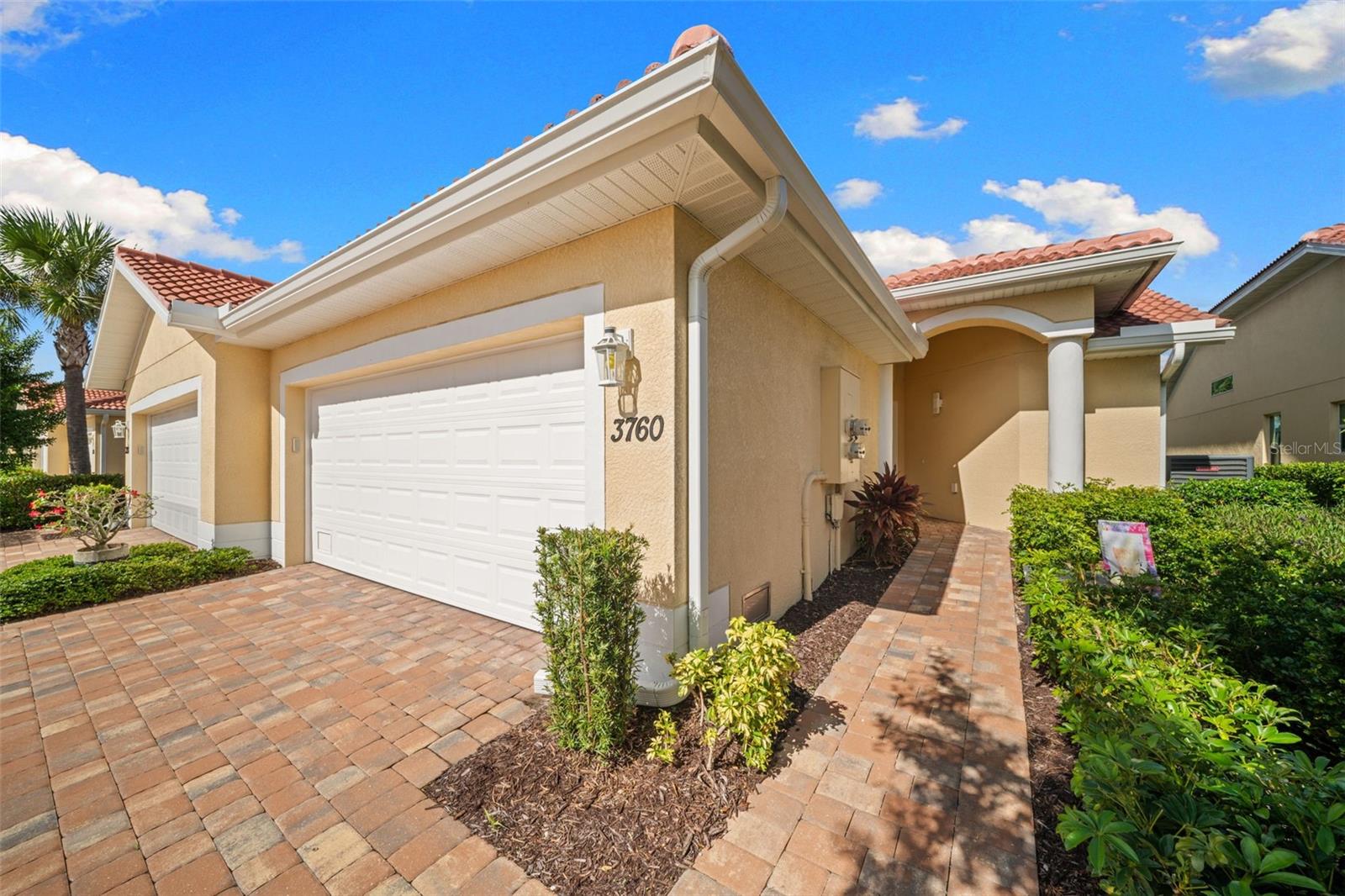 BURNT STORE ISLES! LIKE BRAND NEW 3 BEDROOM, 2 BATH, 2 CAR GARAGE VILLA IN THE DESIRABLE COMMUNITY OF VILLA GRANDE! Enjoy a low-maintenance lifestyle with modern comforts and everyday convenience. Step inside to discover an open-concept floor plan complemented by high ceilings, neutral colors, and tile flooring throughout the main living areas. The heart of the home, the kitchen, features white cabinetry, granite countertops, stainless-steel appliances, and a breakfast bar. An adjoining breakfast nook and separate dining area provide additional spaces for casual meals and entertaining guests. The spacious living room seamlessly connects to the screened lanai through sliding glass doors, creating an easy transition between indoor and outdoor living. Toward the back of the home, the spacious primary suite offers a comfortable retreat with high ceilings and an ensuite bath featuring a large walk-in closet, an additional linen closet, a spa-style walk-in shower, dual vanities, and a separate water closet for added privacy. The two guest bedrooms offer flexibility for visiting family, overnight guests, or a home office, and share a well-appointed guest bath. Everyday tasks are made easier with the oversized laundry room, complete with a storage closet, sink with vanity, and direct access to the attached two-car garage. Beyond your front door, enjoy the benefits of community living with access to a community pool and clubhouse. HOA fees include flood insurance, grounds maintenance, and irrigation adding to the convenience of this low-maintenance lifestyle. Located in the popular Burnt Store Isles golf and boating community, this villa is just minutes from Twin Isles Country Club and a short drive to Fishermen’s Village, the Yacht Club, and historic downtown Punta Gorda. Enjoy nearby arts and cultural events, entertainment, boating, world-class fishing, fine dining, and beautiful parks, along with convenient access to I-75. Discover the best of Southwest Florida living in this inviting villa!