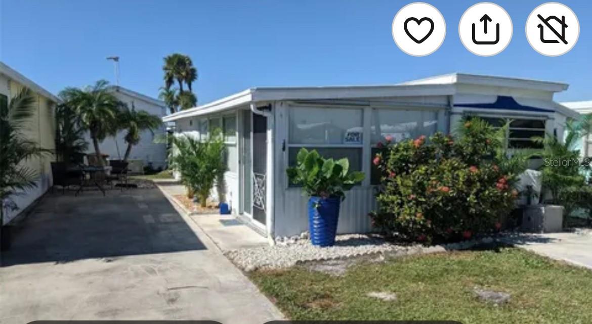 Welcome to easy Florida living in the gated 55+ community of Holiday Travel Park! This charming, turnkey 1-bedroom, 1-bath manufactured home offers 519 square feet of comfortable living space and, best of all, you own the land—no lot rent! The bright and spacious Florida room provides the perfect place to relax or entertain, while the interior features a cozy living area, dining space, galley-style kitchen, generous storage, and a full-size walk-in tiled shower.

Enjoy an active, friendly community with a swimming pool, shuffleboard, bocce ball, horseshoes, indoor pickleball, community boat ramp, activity center, and organized social events. Conveniently located near Englewood’s beautiful Gulf beaches, boating, golf, shopping, and popular local restaurants, this affordable Florida retreat is ideal for seasonal or year-round living. Pack your bags and start enjoying your slice of paradise!