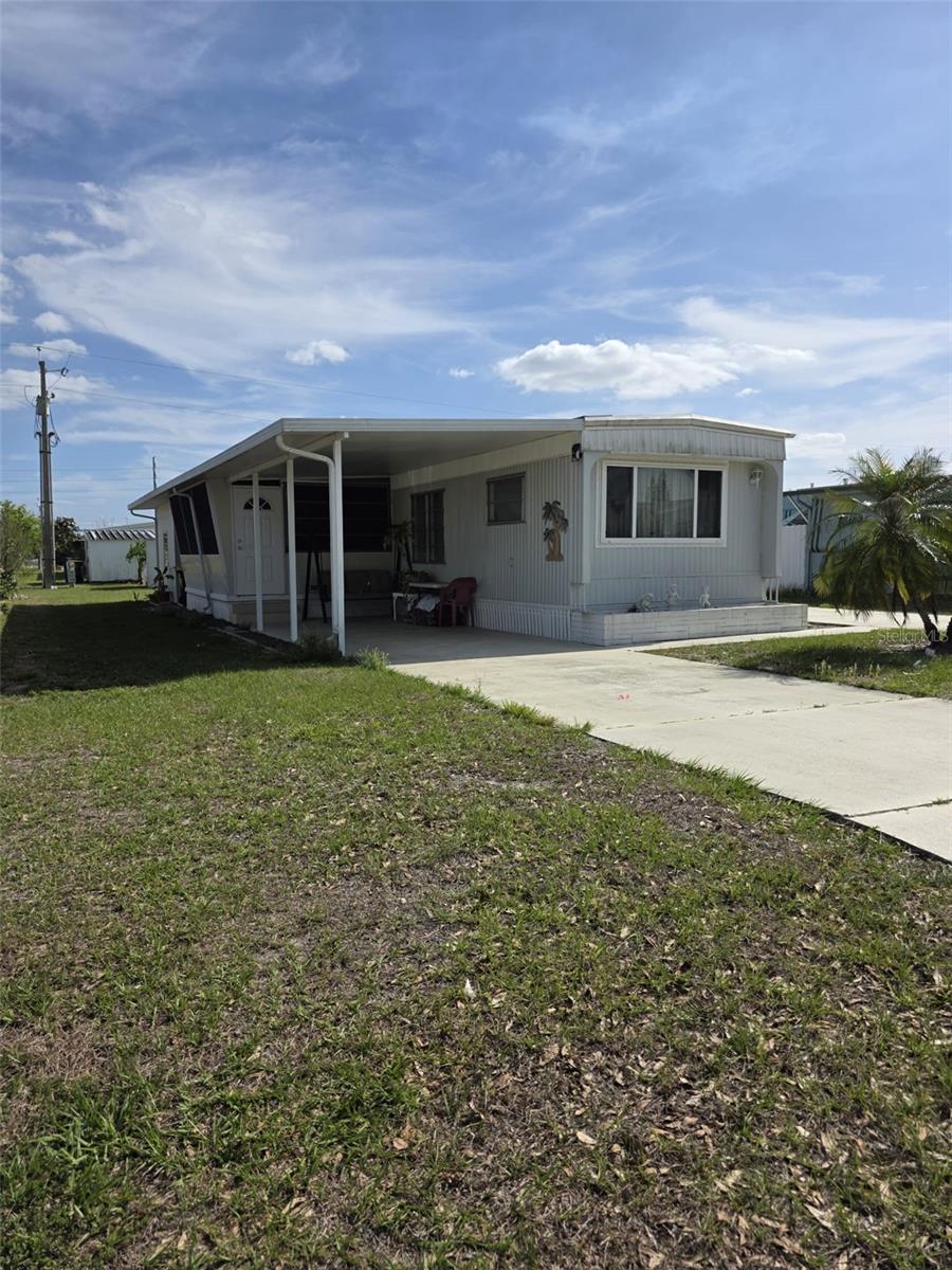 Welcome to Fairmount Mobile Estates! An excellent opportunity to unleash your creative vision awaits in this 2-bedroom, 2-bathroom home located in Fairmount Mobile Estates. Featuring a functional layout with well-defined living spaces, this property serves as a true blank canvas, ready for your personal touch. One of the key advantages of this property is the land ownership: you hold full title to the land itself, with no HOA fees or CDD charges to pay. Notable features include a metal roof, a kitchen equipped with a gas stove, and a spacious front porch. Outdoors, the property boasts two driveways offering ample private parking, as well as a practical storage shed that can also serve as a workshop. Enjoy a prime location less than 3 minutes from US Highway 27 N., providing convenient access to major shopping centers, restaurants, and medical facilities. Sold "As-Is." Contact your real estate agent today to schedule a private showing.